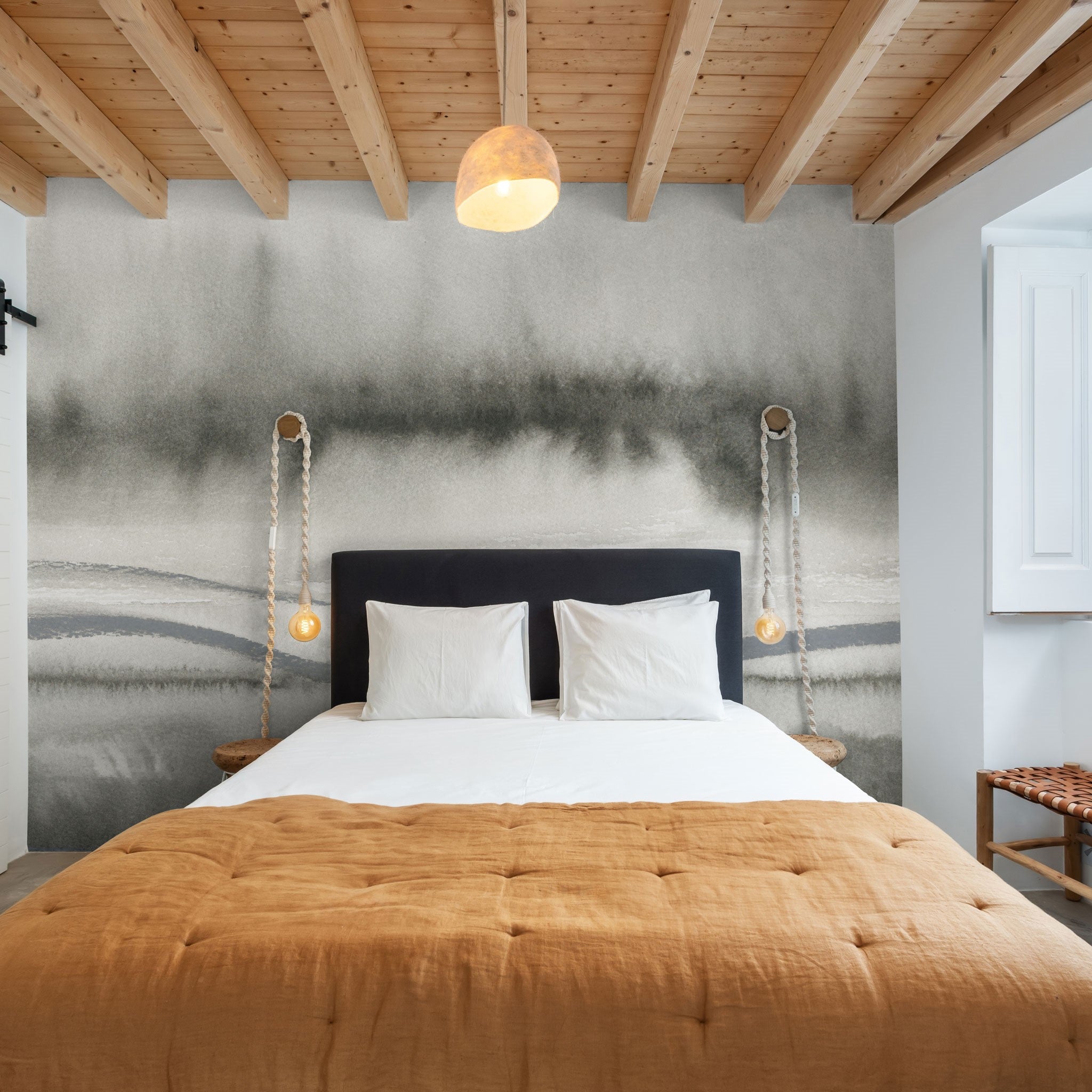 "Obsidian Wallpaper by Wall Blush in a modern bedroom with wooden accents emphasizing wall design."