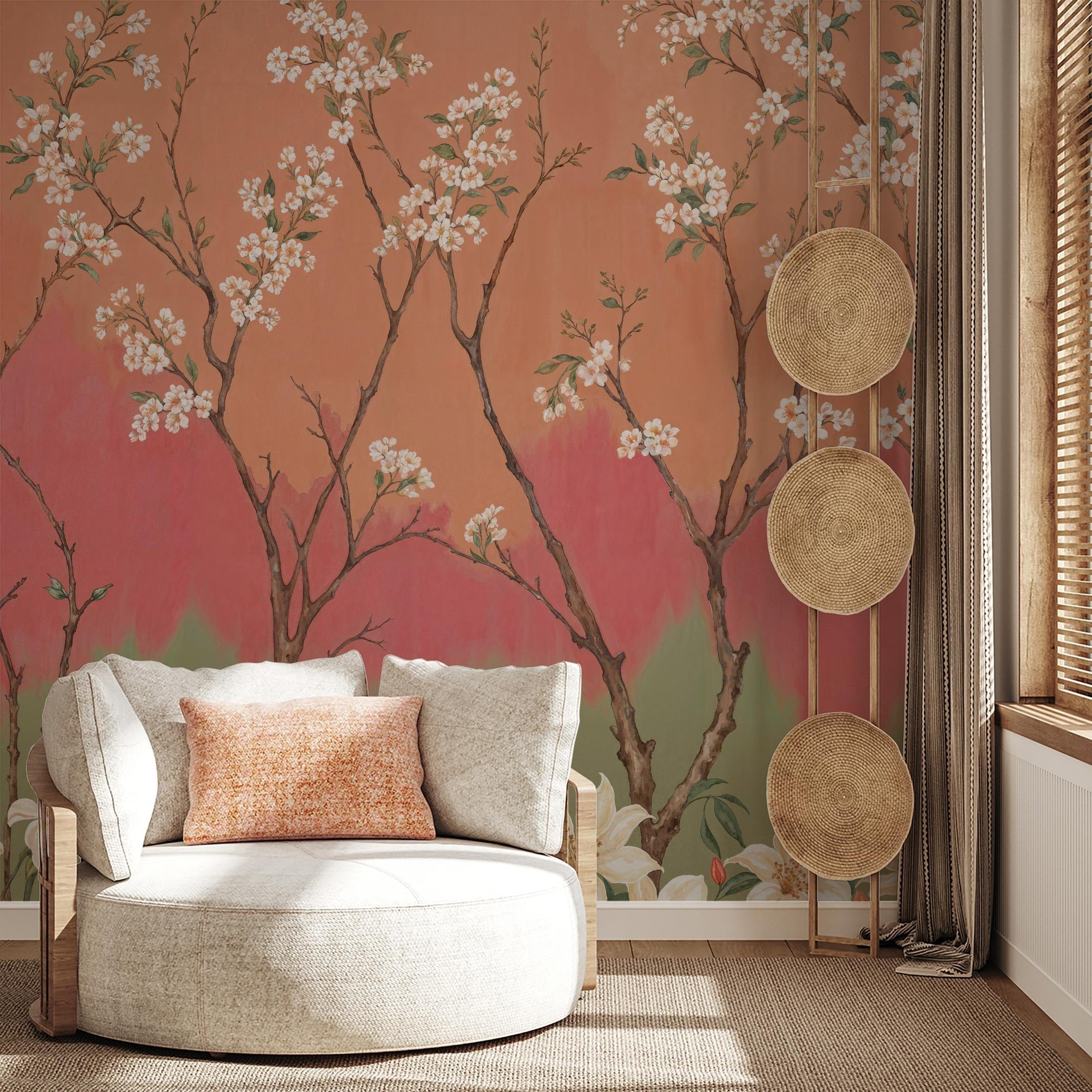 "Wall Blush Ombre Bloom Wallpaper in cozy living room with elegant sofa and decorative hats."