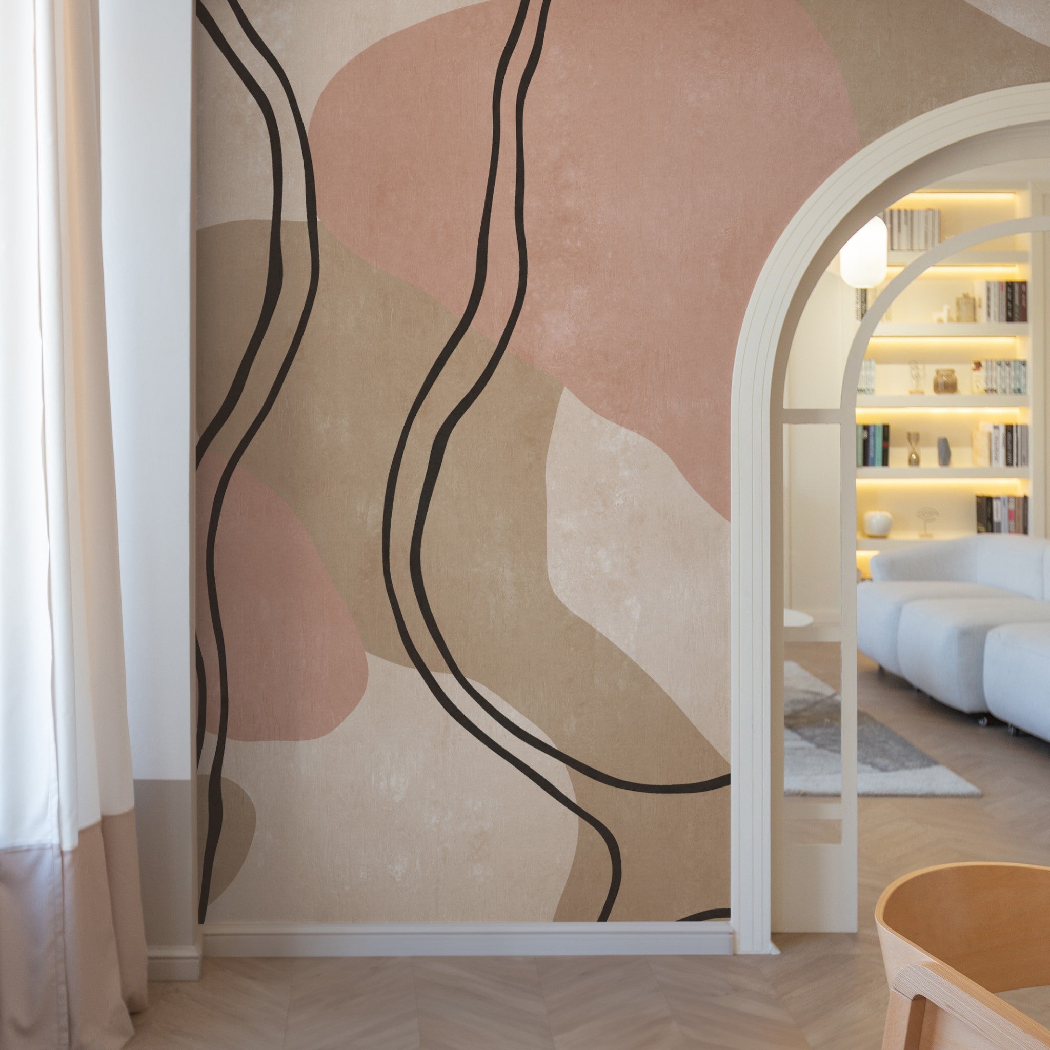 "Breve Wallpaper by Wall Blush with abstract design in a modern living room, highlighting the wall decor."