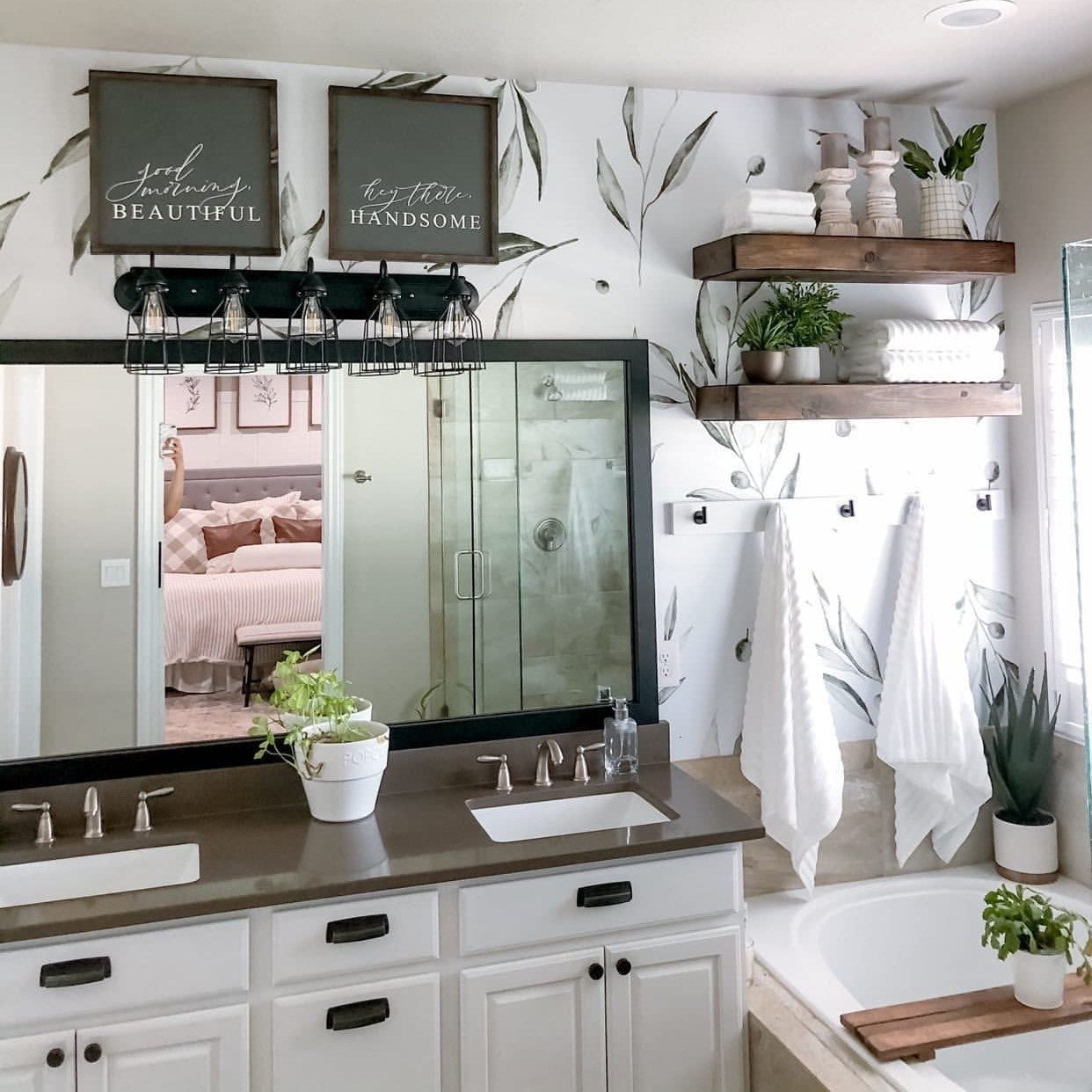 "Fiona Wallpaper by Wall Blush in a stylish bathroom showcasing elegant botanical designs and modern decor accents."