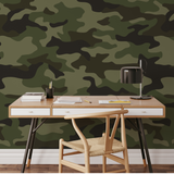 "Abbott Wallpaper by Wall Blush in a home office, featuring a distinctive camouflage pattern on the main wall."