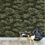 "Wall Blush's Abbott Wallpaper in a stylish children's room, featuring a modern camouflage design."