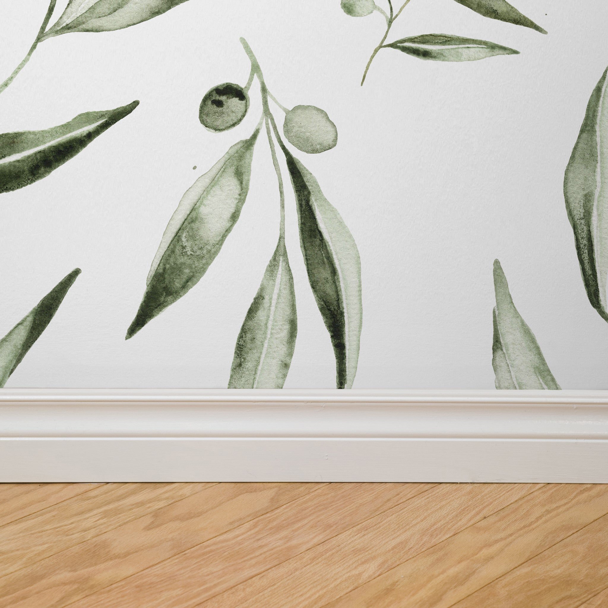 "Fiona Wallpaper by Wall Blush featuring botanical design in a living room setup with clear focus on the wall."