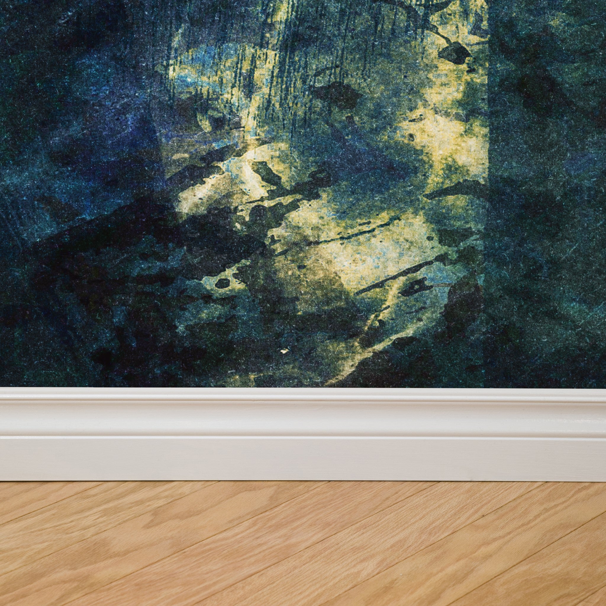 "Baudelaire Wallpaper by Wall Blush, elegant abstract design in a living room setting with focus on wallpaper."