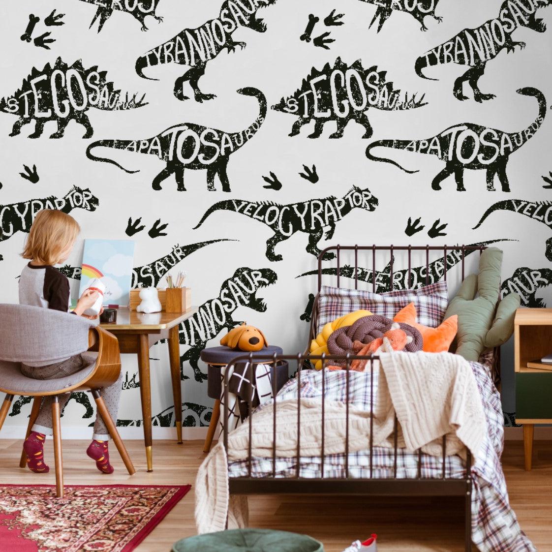 Child's bedroom featuring Wall Blush's Dino Rush Wallpaper with playful dinosaur pattern.