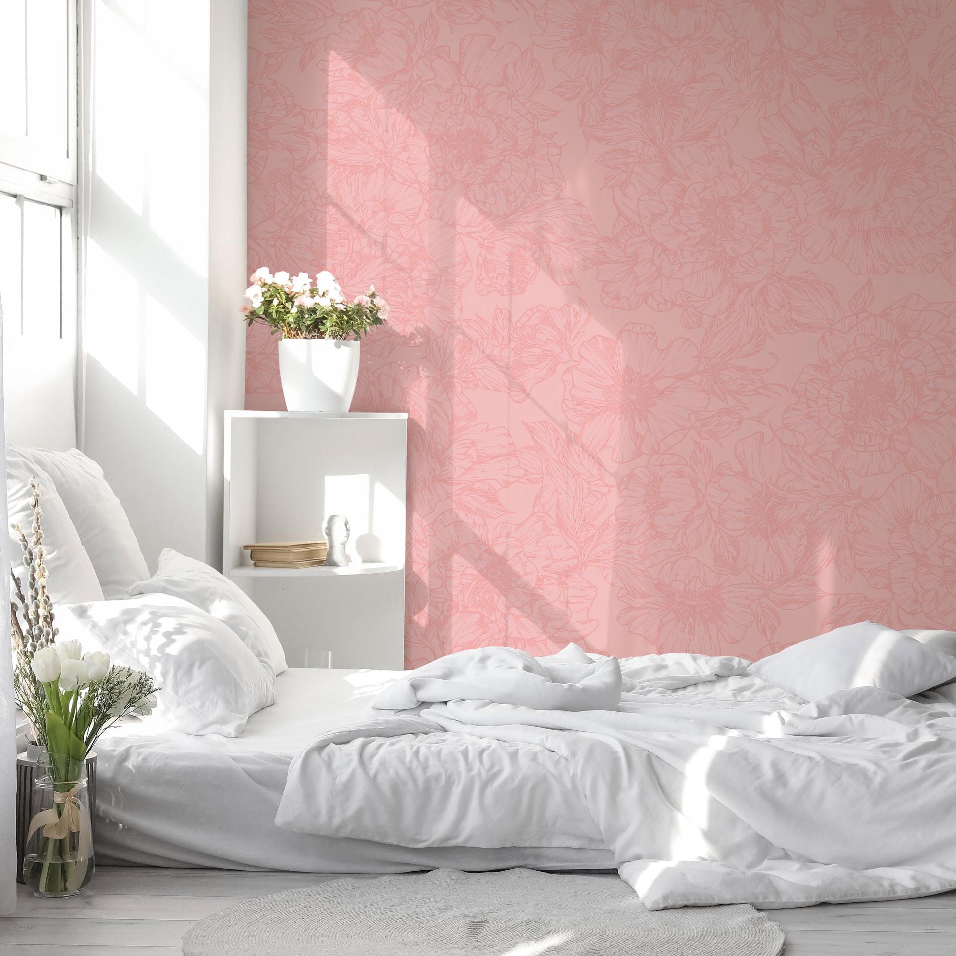 The Dutchess Pink Wallpaper from The Ania Zwara Line in a bright bedroom with sunlight streaming in.