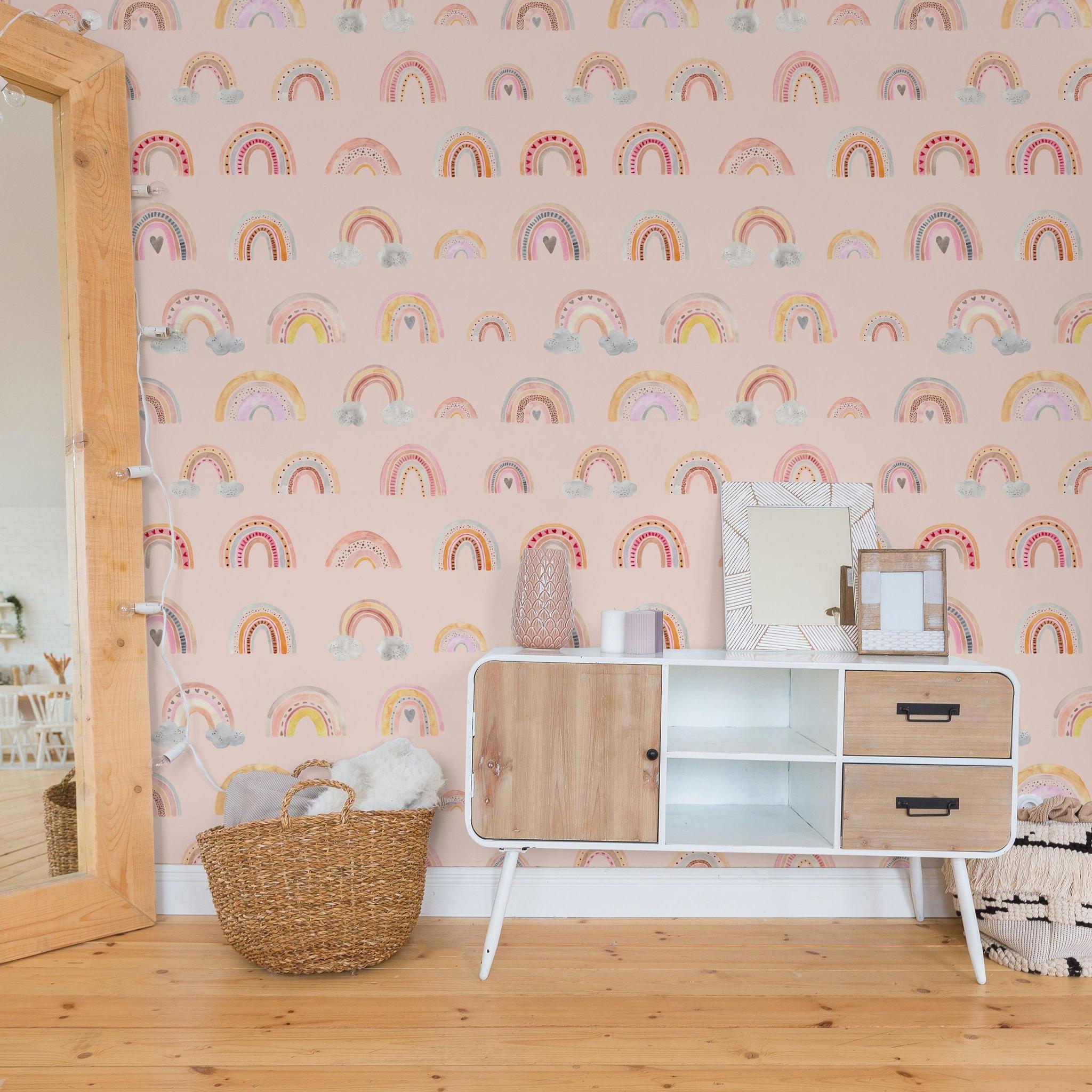 Wall Blush's Eden's Rainbows Wallpaper in a stylish nursery with modern furnishings, enhancing room decor.