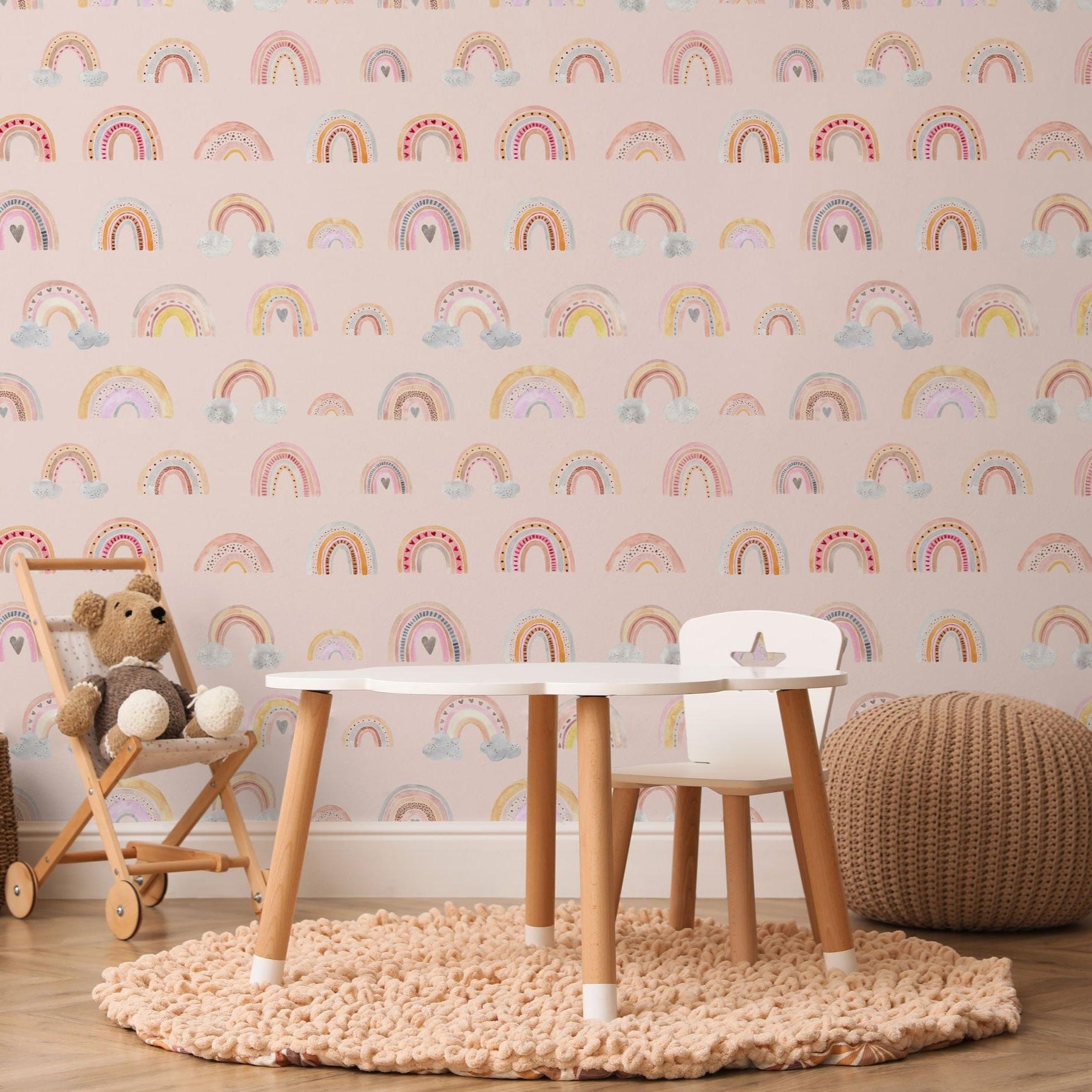 Wall Blush's Eden's Rainbows Wallpaper in a cozy children's bedroom, accentuating the playful decor.