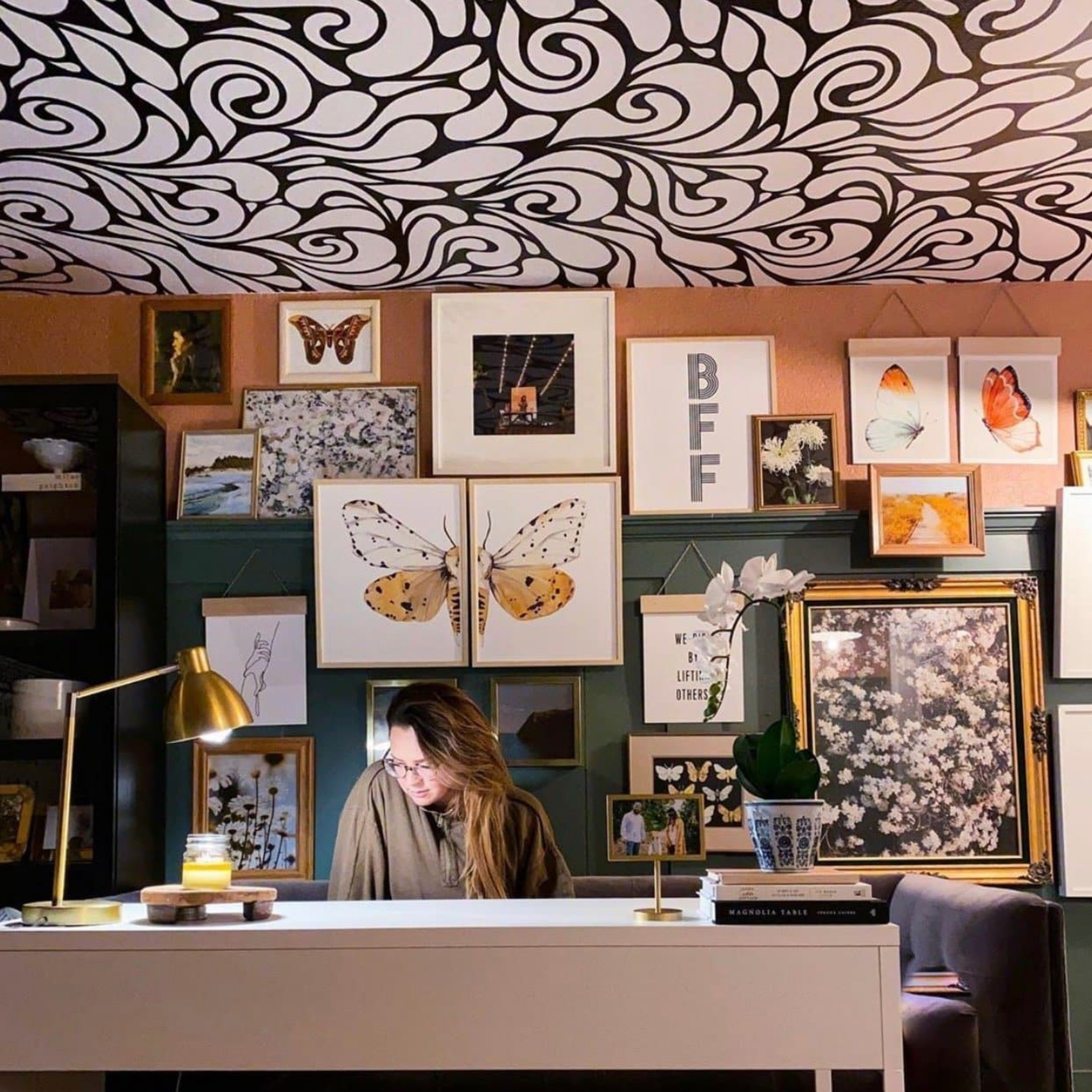 "Flowers of Jade Wallpaper by Wall Blush enhances home office aesthetics with its elegant design."