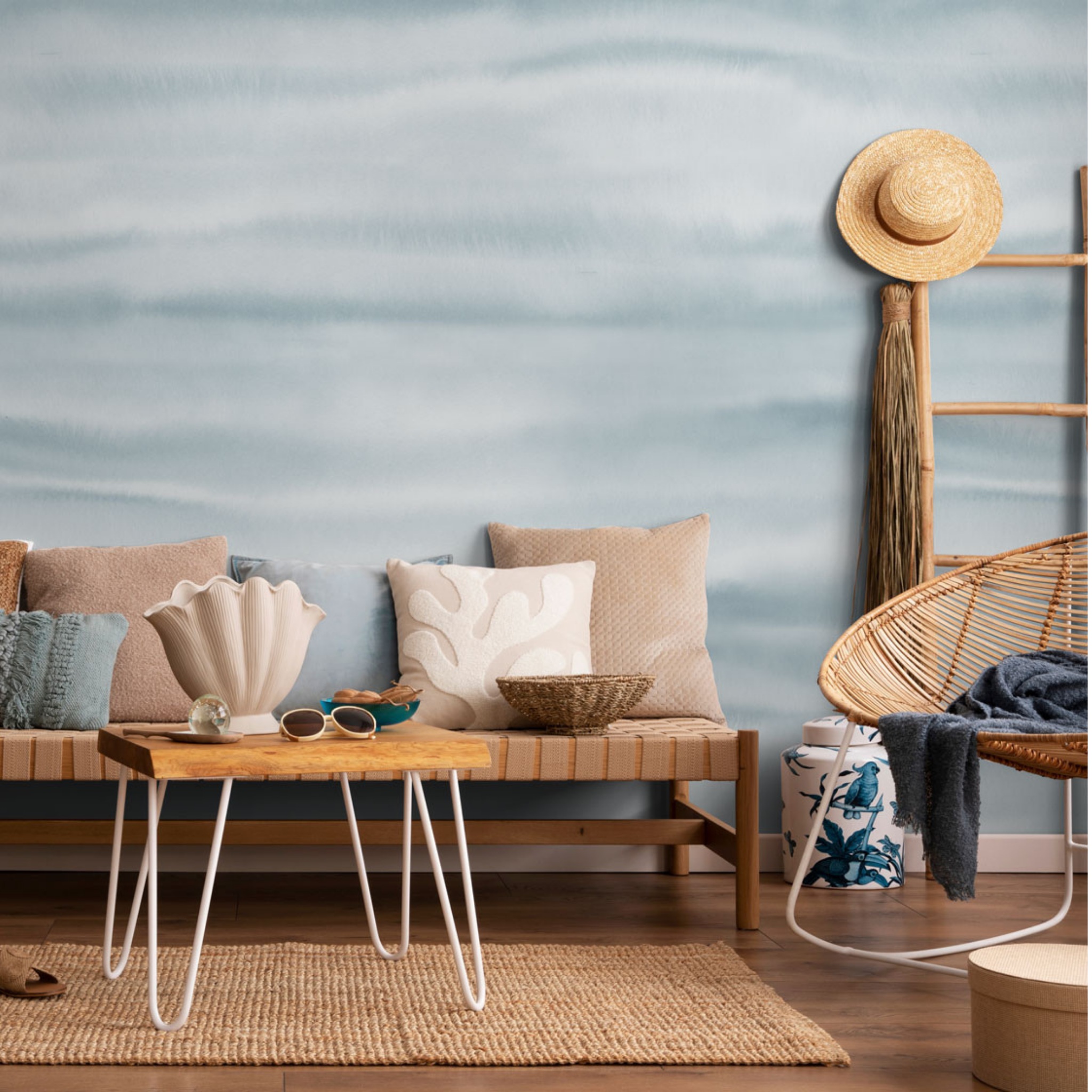 "Elegant Fraya (Arctic) Wallpaper by Wall Blush in stylish living room interior with cozy furnishings."