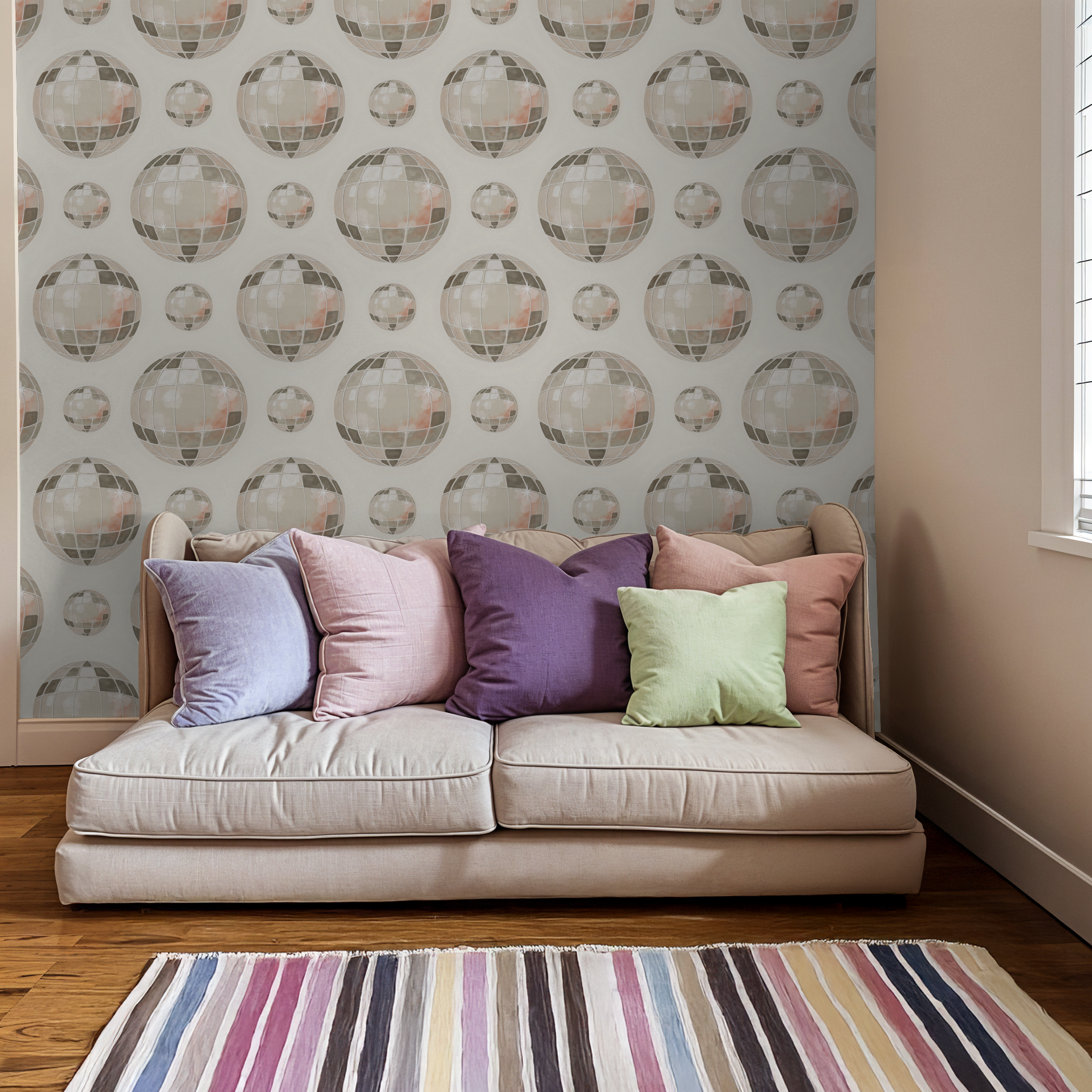 Abstract geometric wallpaper with mirrored globes in taupe and blush in a cozy living room.
