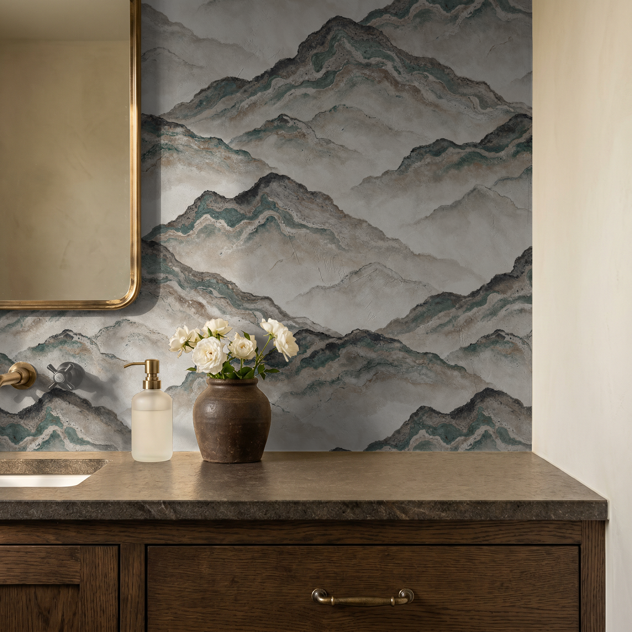 Mountain-inspired wallpaper with earth tones in a rustic bathroom setting.