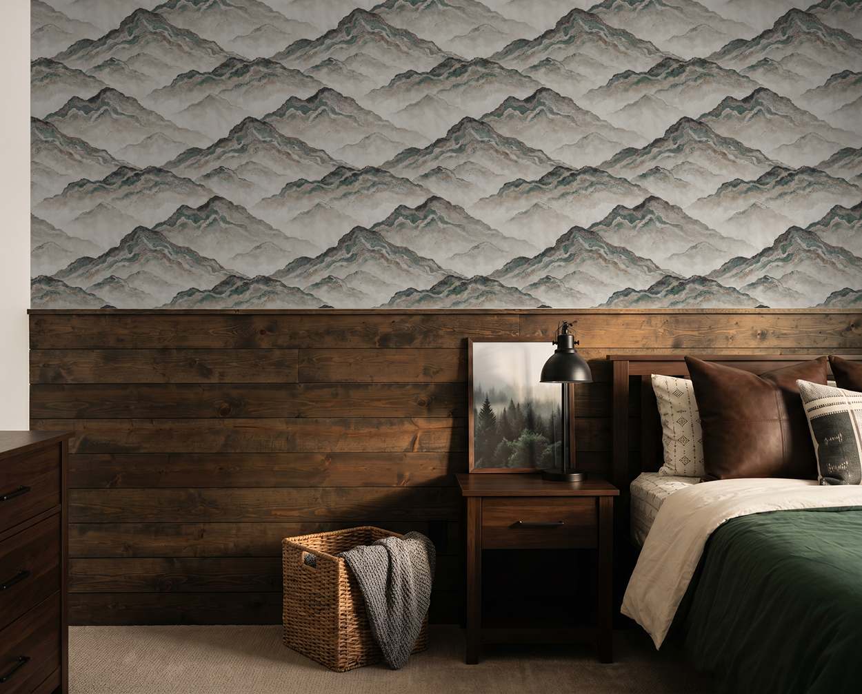 Mountain landscape wallpaper in earth tones in a rustic bedroom setting.