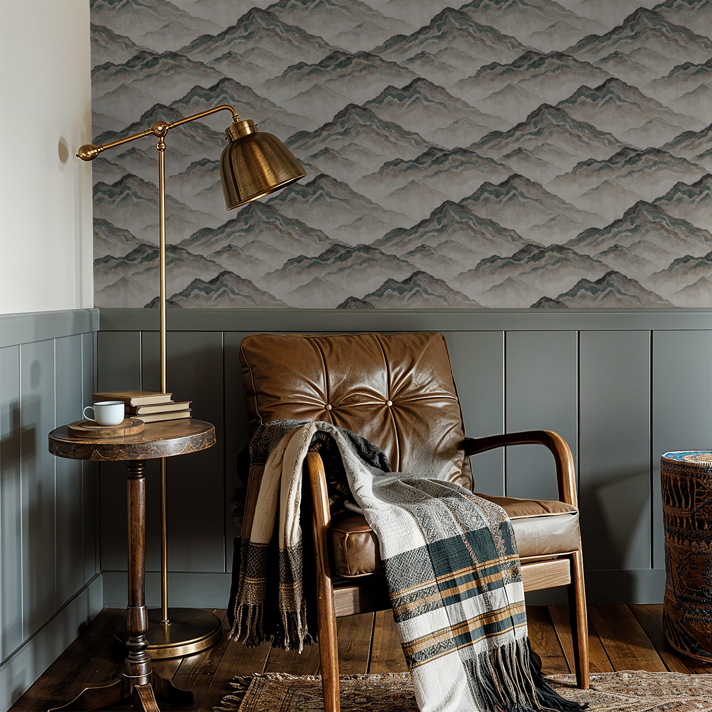 Aurith mountain wallpaper in earth tones with leather chair and rustic decor.