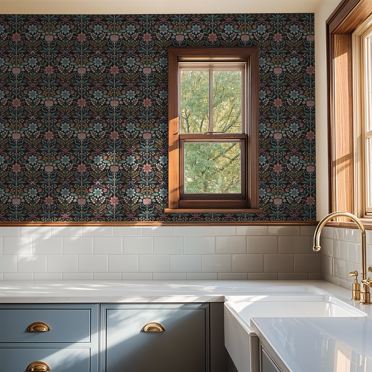 Bloomshire floral wallpaper in kitchen with blue cabinets and white tiles.