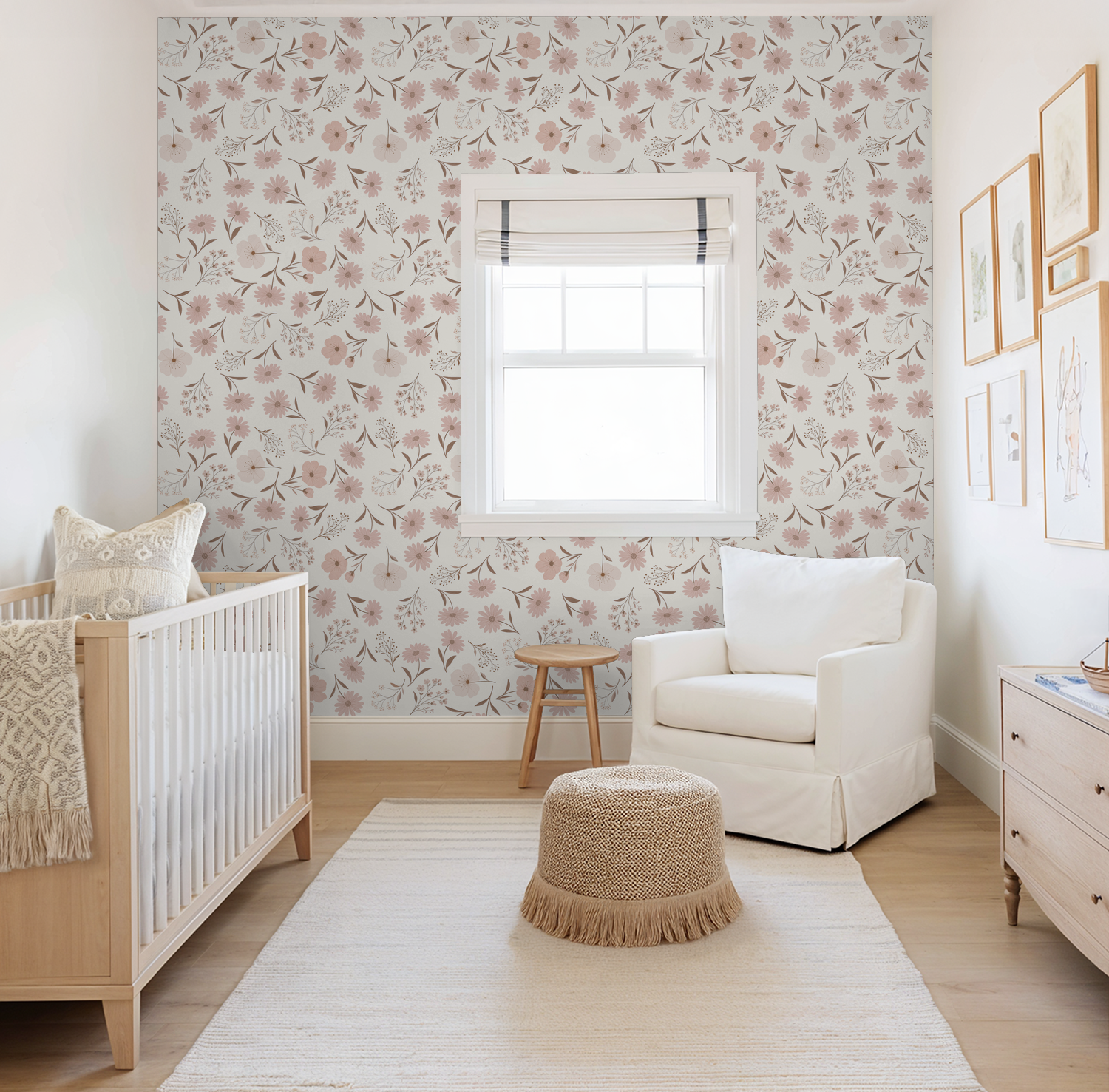 Blush floral wallpaper in serene nursery with crib and white armchair.