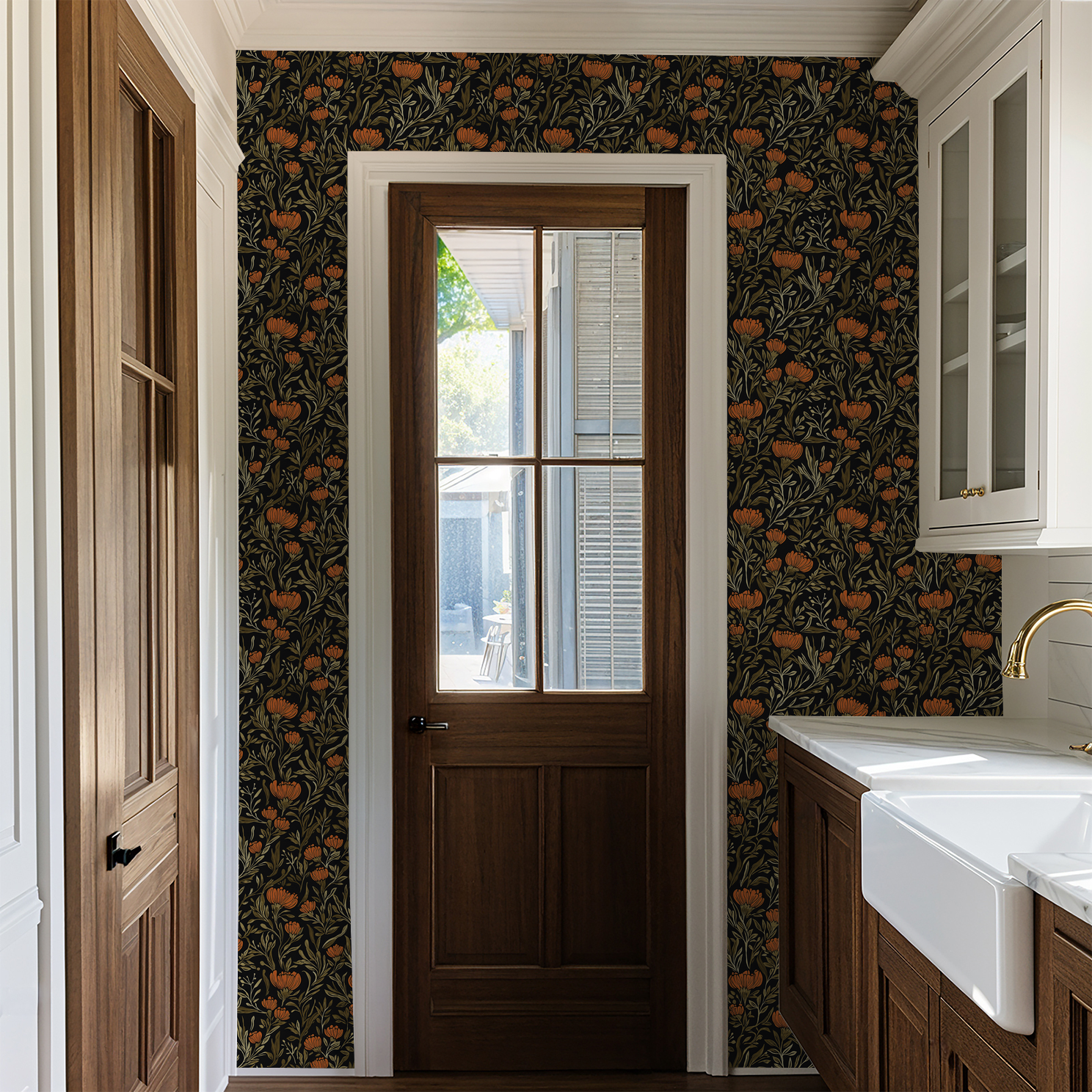 Bold orange floral wallpaper with black background in a modern kitchen setting.