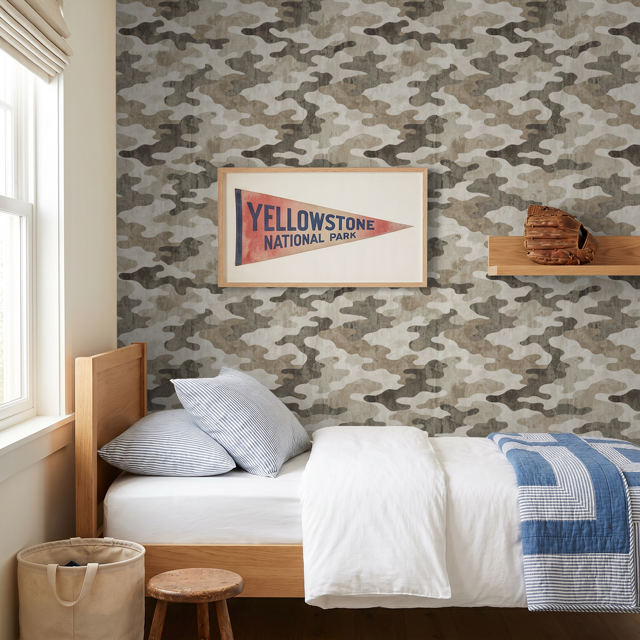 Camouflage pattern wallpaper in earth tones in a cozy bedroom with wooden bed and decor.