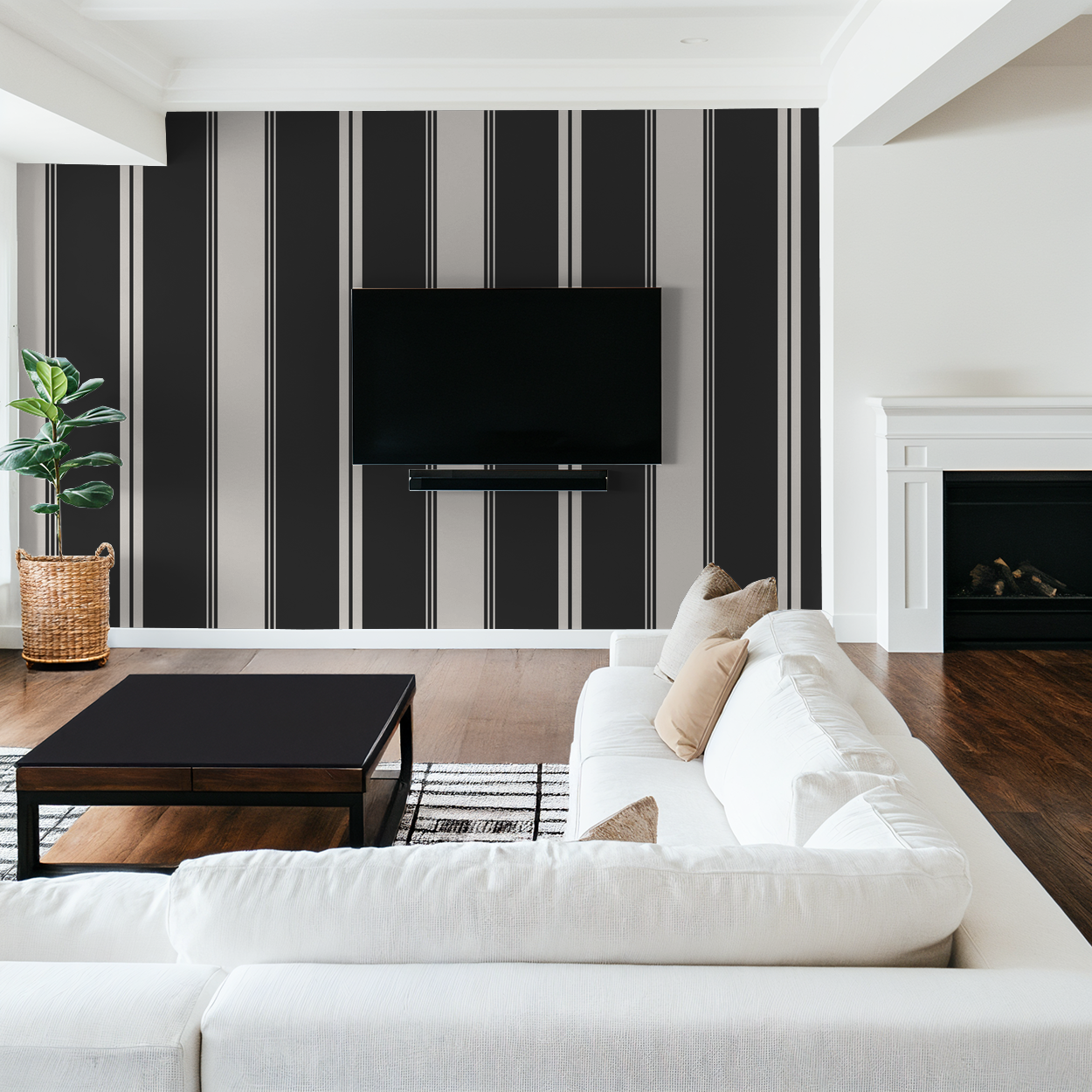 Charcoal and cream striped wallpaper in modern living room with white sofa.