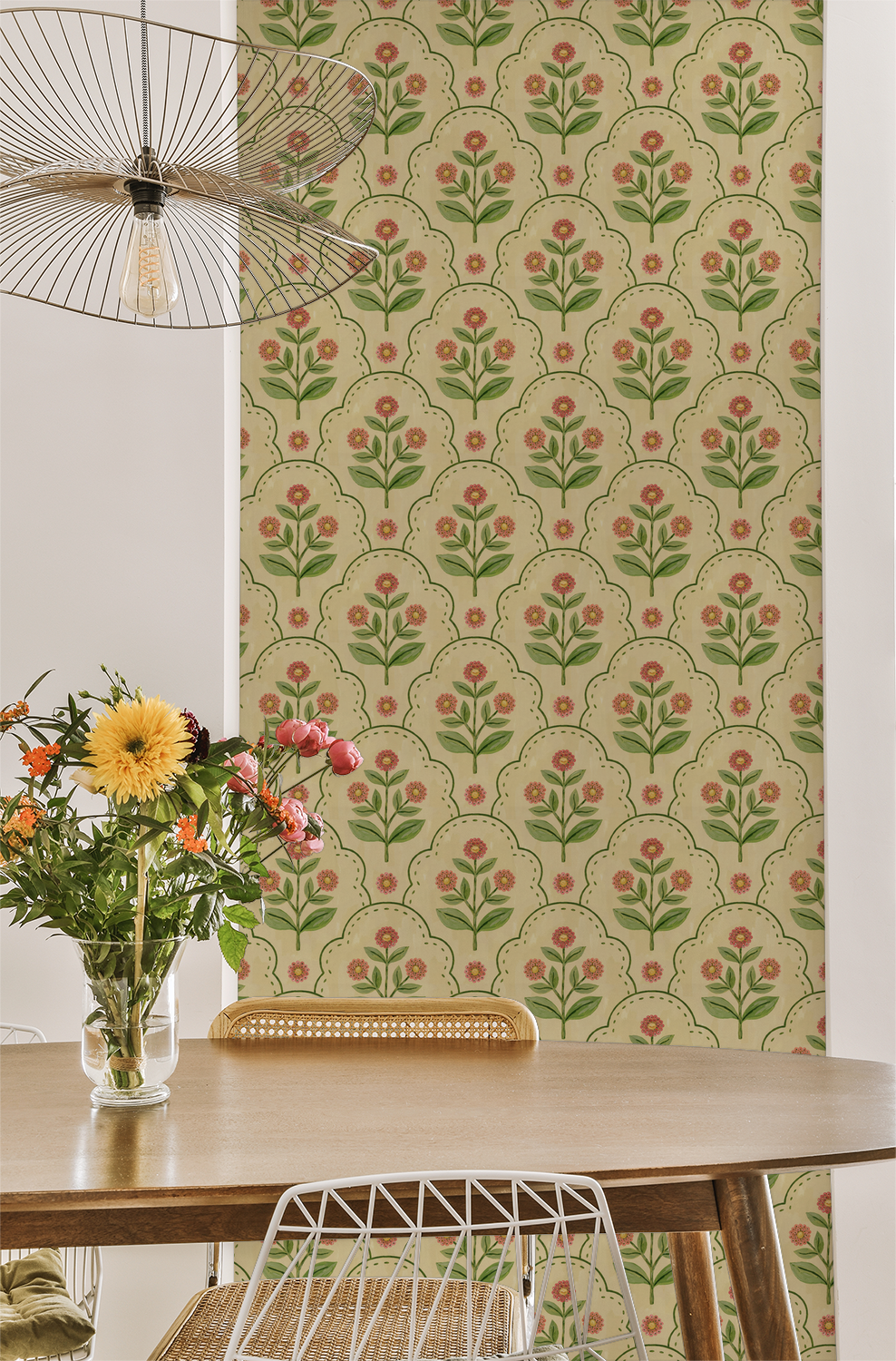 Floral wallpaper with coral and green motifs in a dining room setting