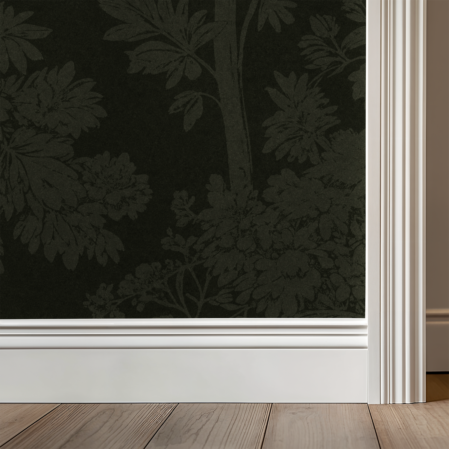 Dark green floral wallpaper with foliage pattern in elegant room setting.