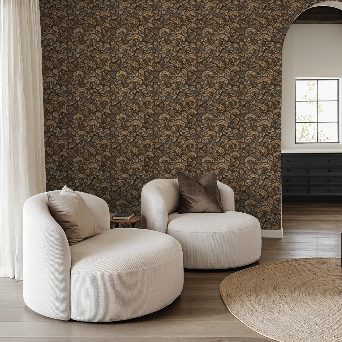 Elderflower wallpaper with brown and blue floral pattern in elegant living room.