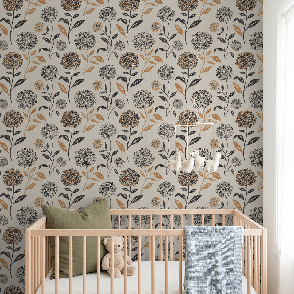 Floral wallpaper with terracotta and charcoal blooms in a nursery with crib and teddy bear.