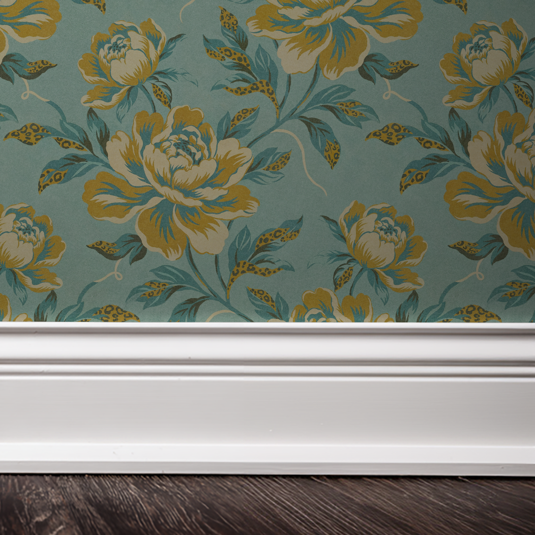 Floranza wallpaper with golden ochre and teal florals on turquoise background