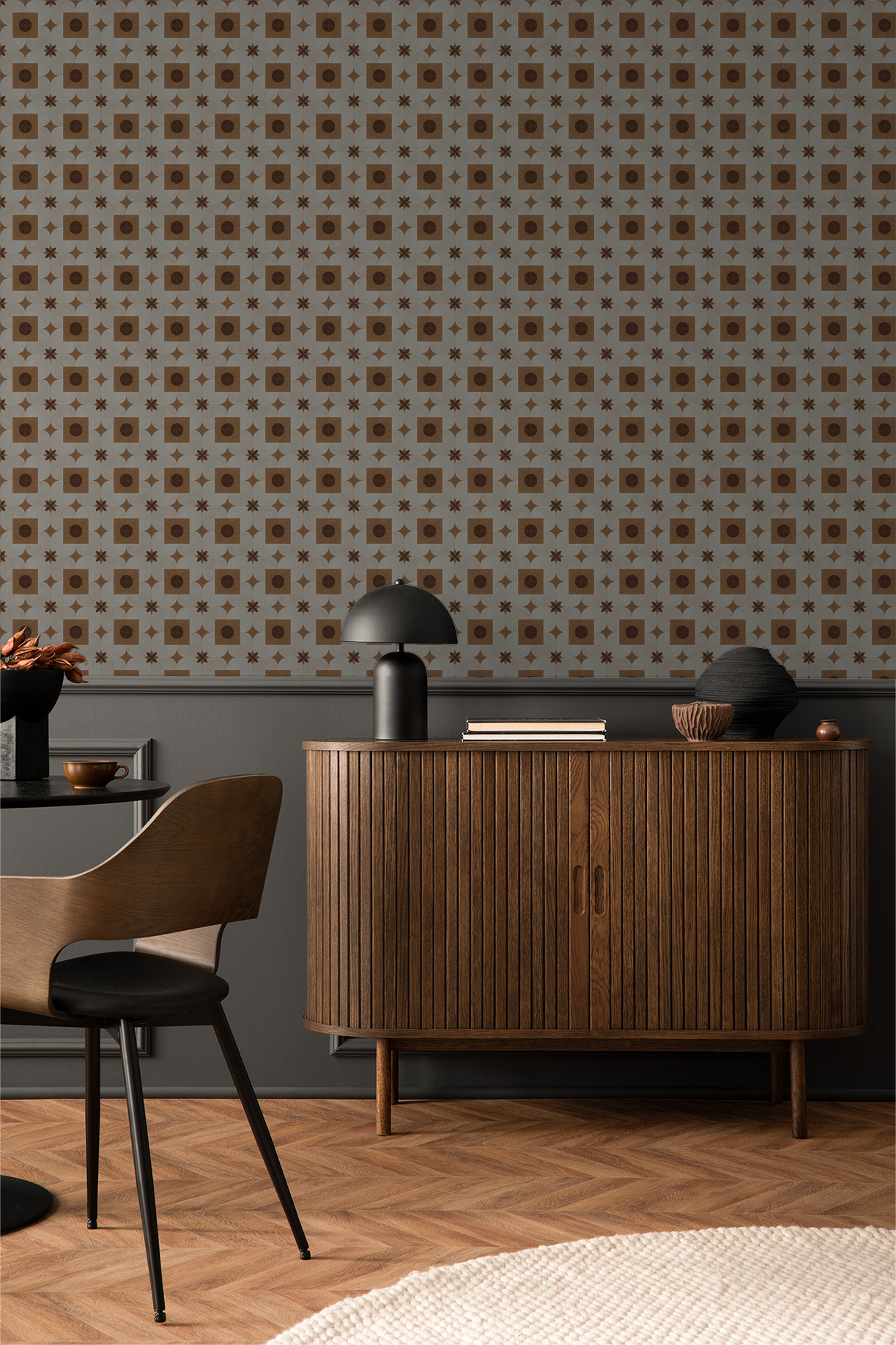 Geometric terracotta and cream wallpaper in modern dining room with wooden furniture.