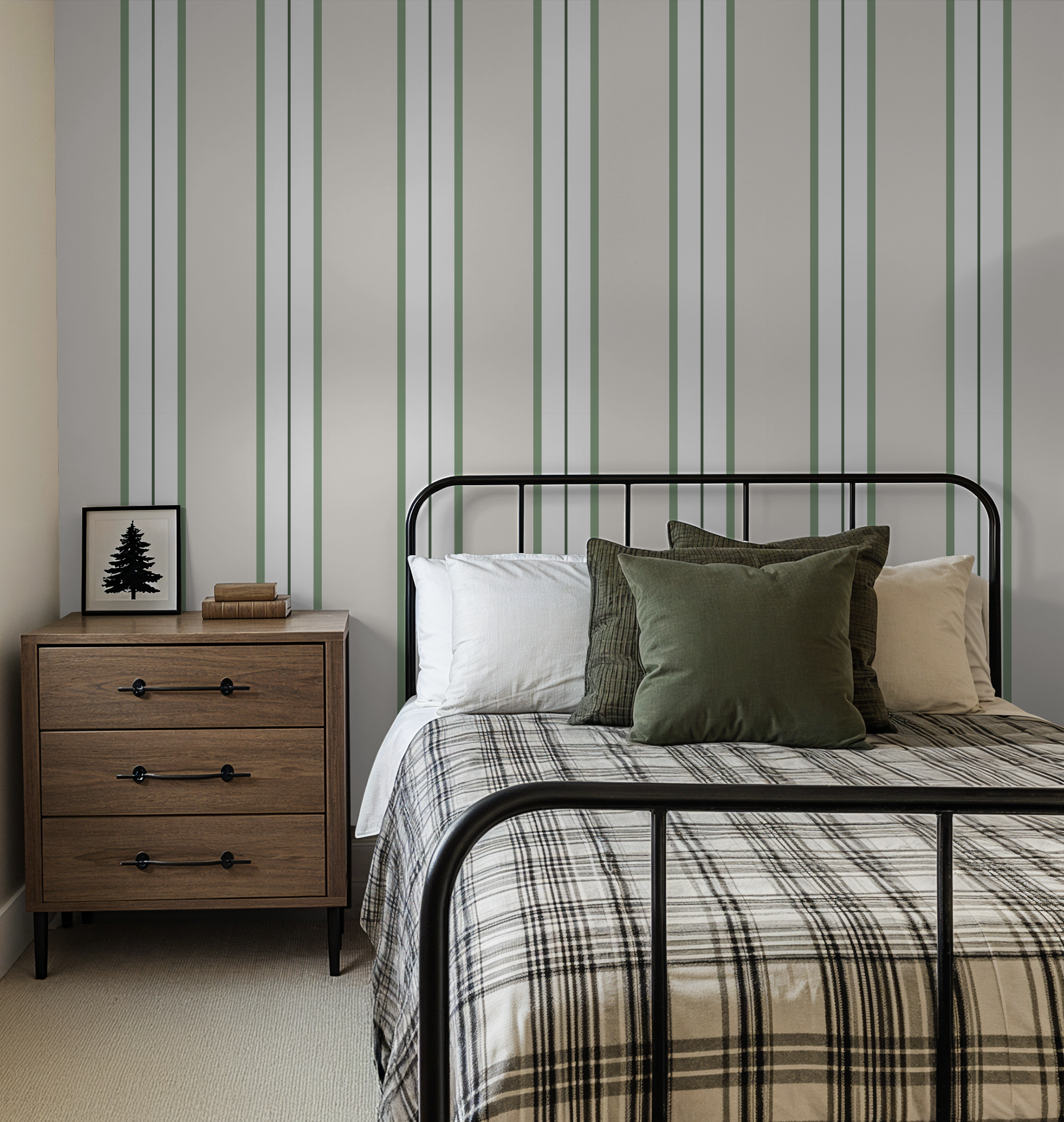 Green striped wallpaper in modern bedroom with metal bed and wooden nightstand.