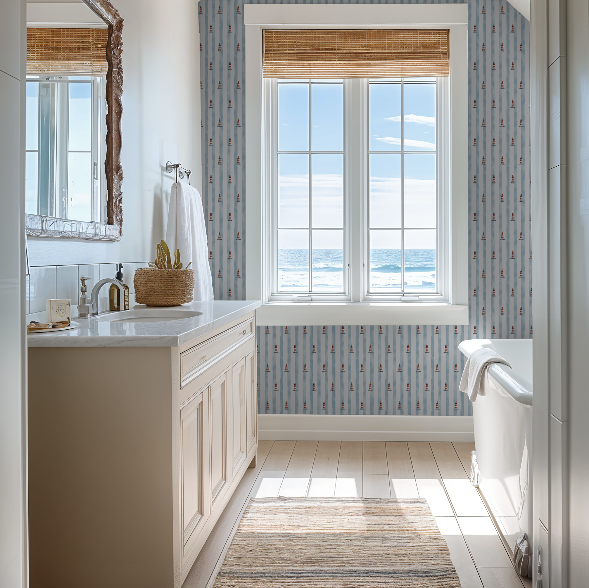 Nautical bathroom with Harbor Light lighthouse wallpaper and ocean view.