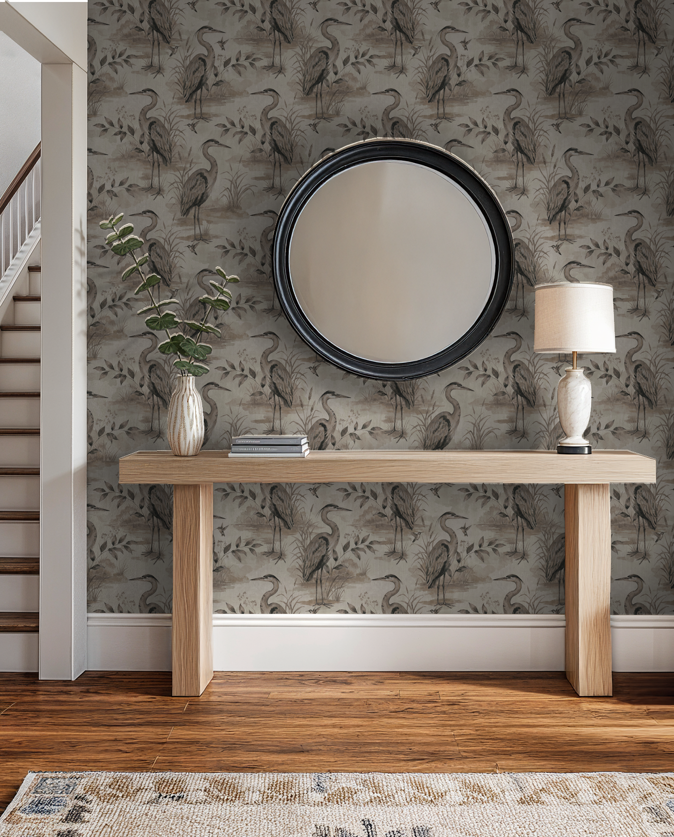 Heron Lake wallpaper with taupe herons and foliage in a rustic hallway setting.