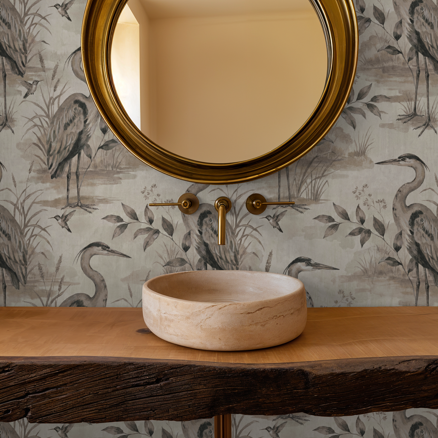 Heron Lake wallpaper with herons and foliage in taupe and sepia in bathroom setting.