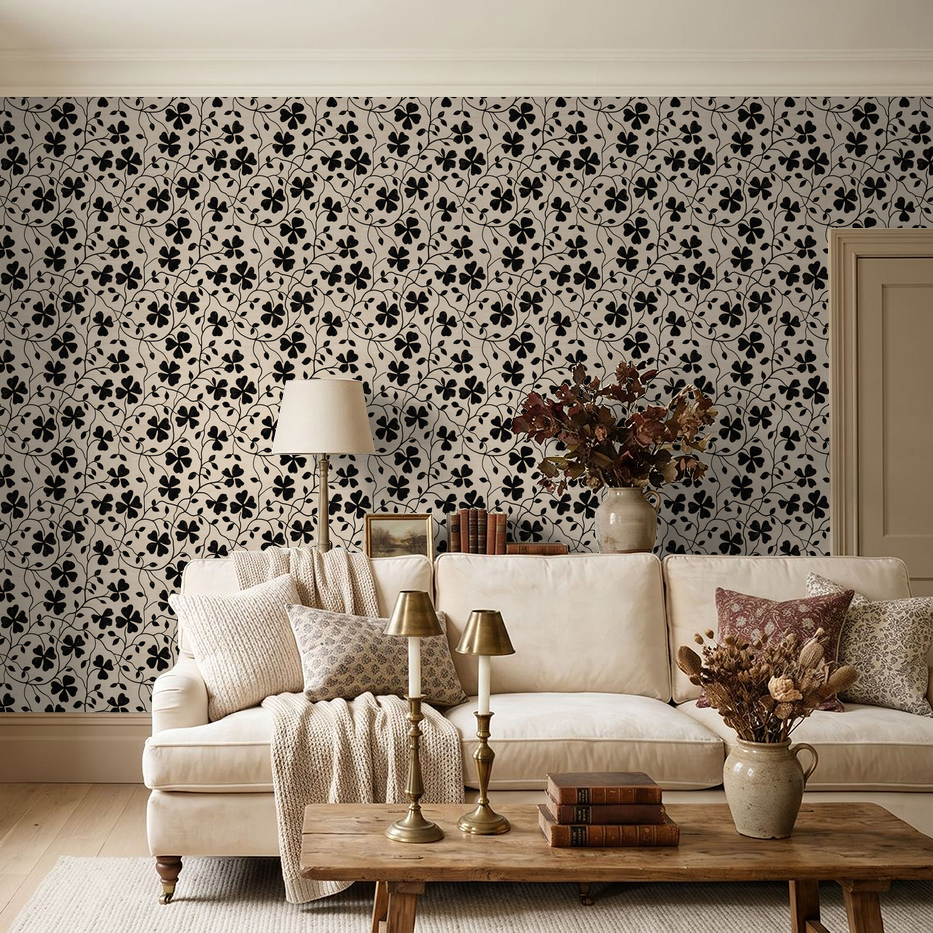 Living room with Lady Luck black floral wallpaper and beige sofa