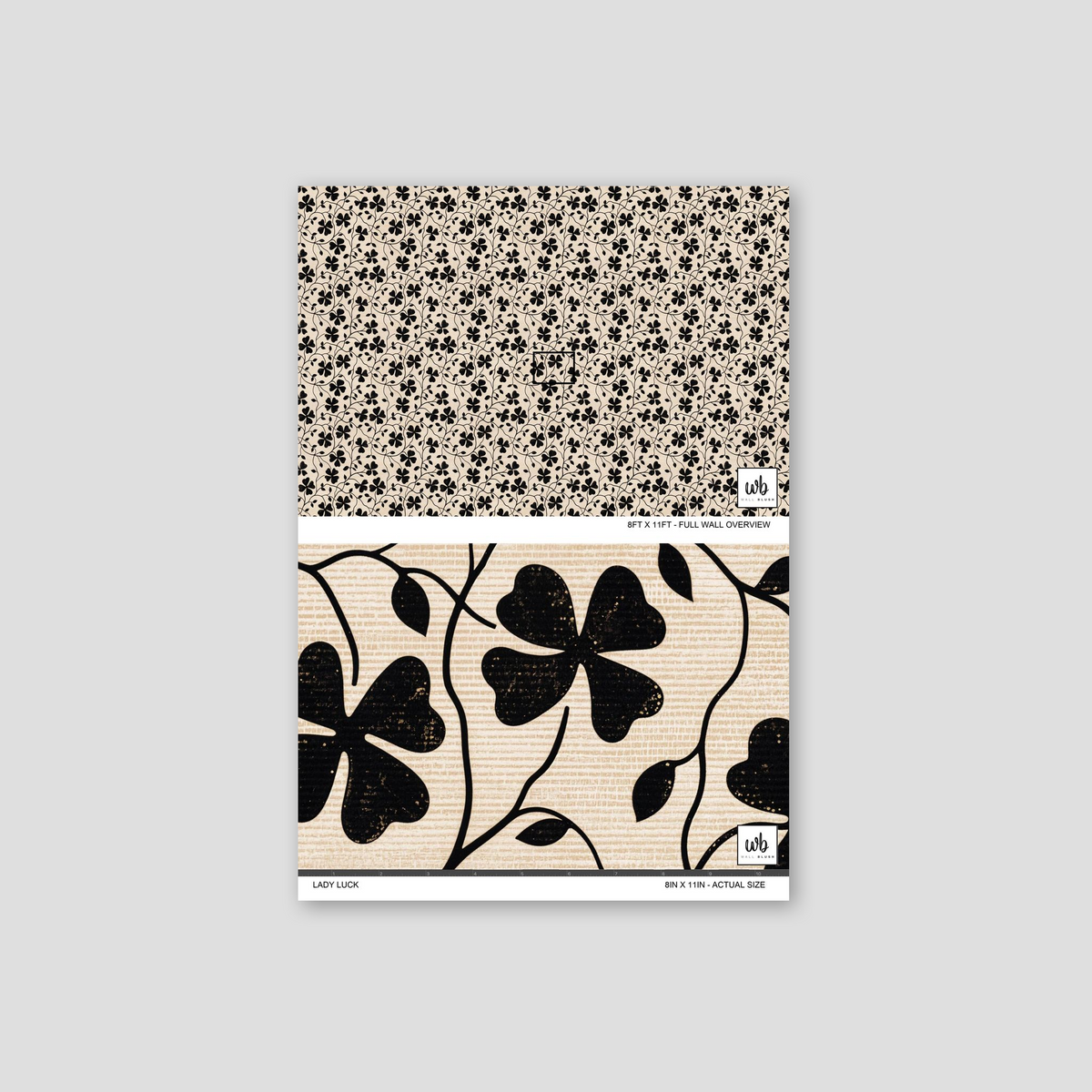 Lady Luck wallpaper with black floral silhouettes on muted background.