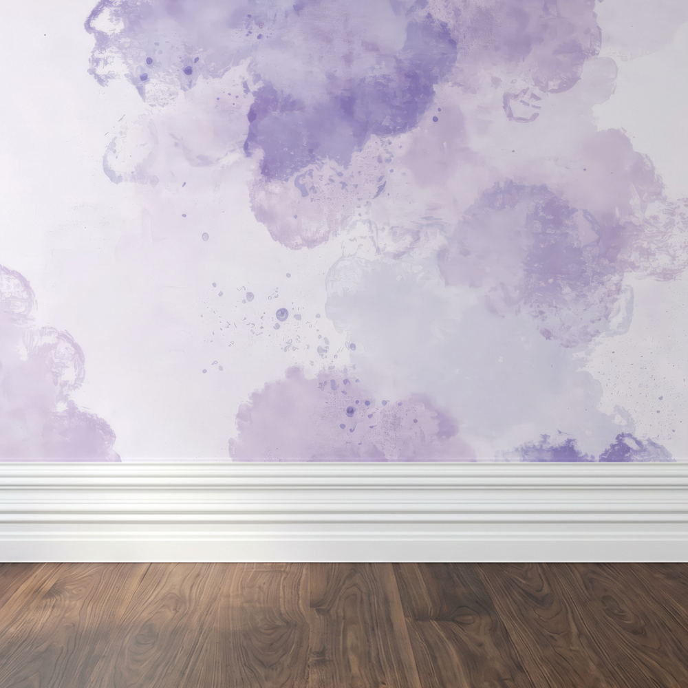 Lavender watercolor abstract wallpaper with cloud-like forms in a room setting.