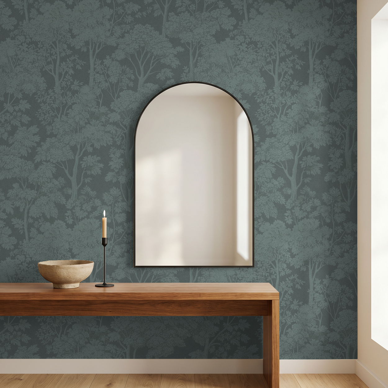 Light teal botanical wallpaper with foliage pattern in modern room with mirror and wooden table.