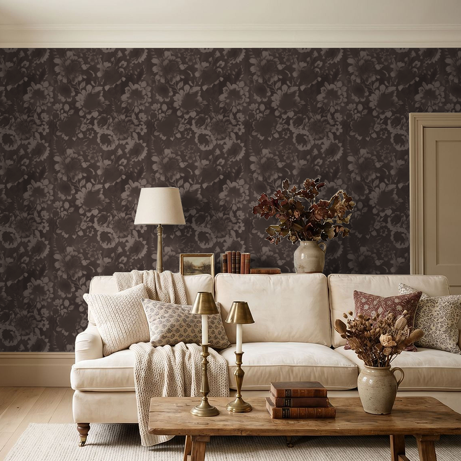Moody floral wallpaper in wine hue in elegant living room with beige sofa and decor.