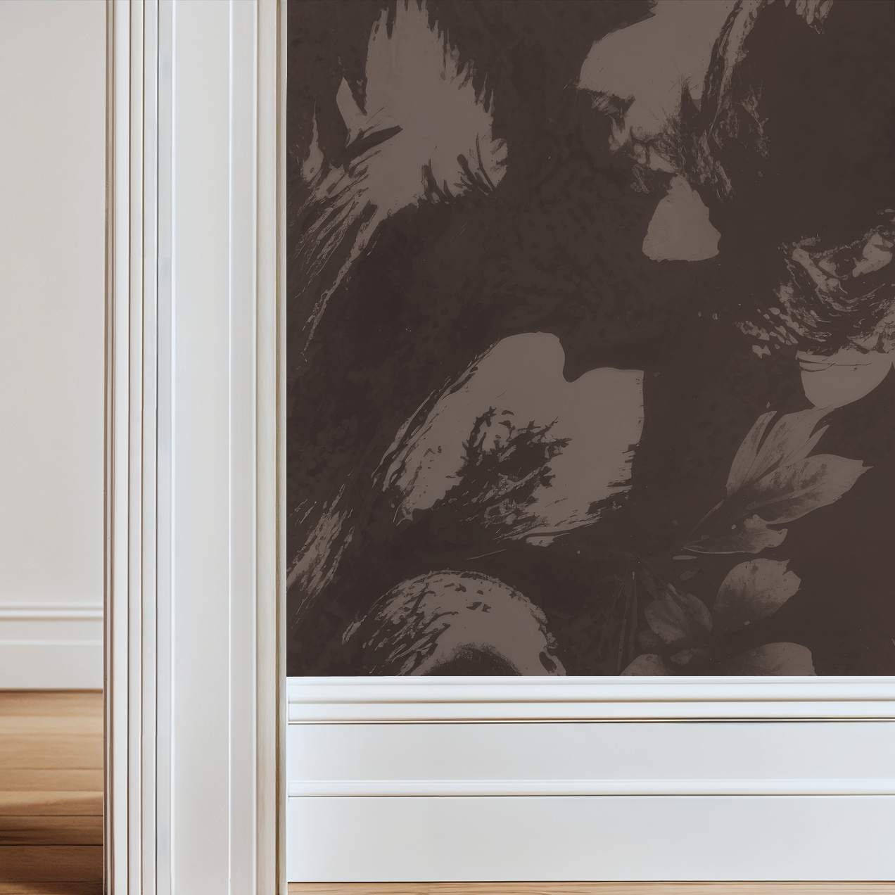 Moody floral wallpaper with deep wine hues and artistic petals in a classic room setting.