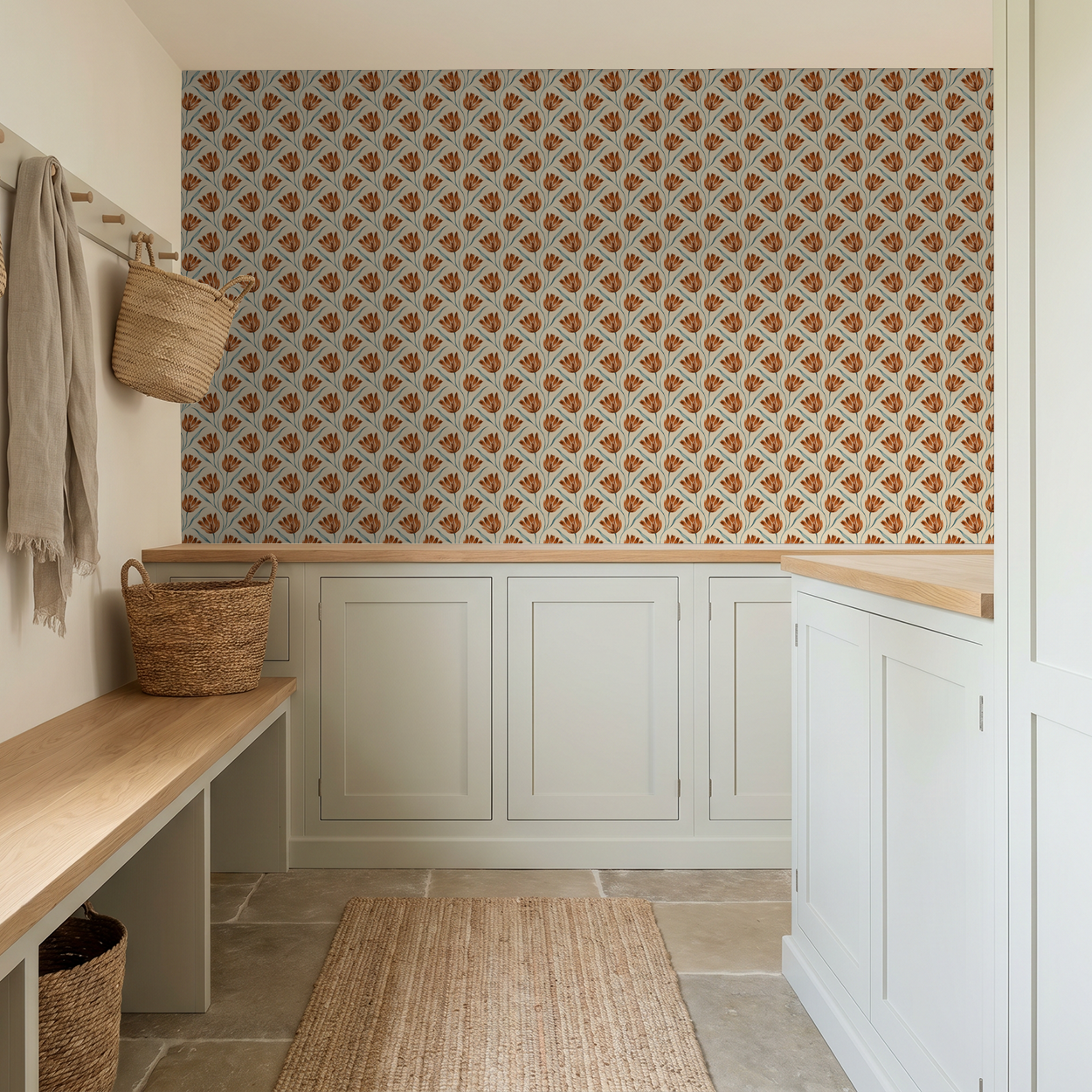 Petal Parade wallpaper with terracotta blooms on cream in a rustic room.