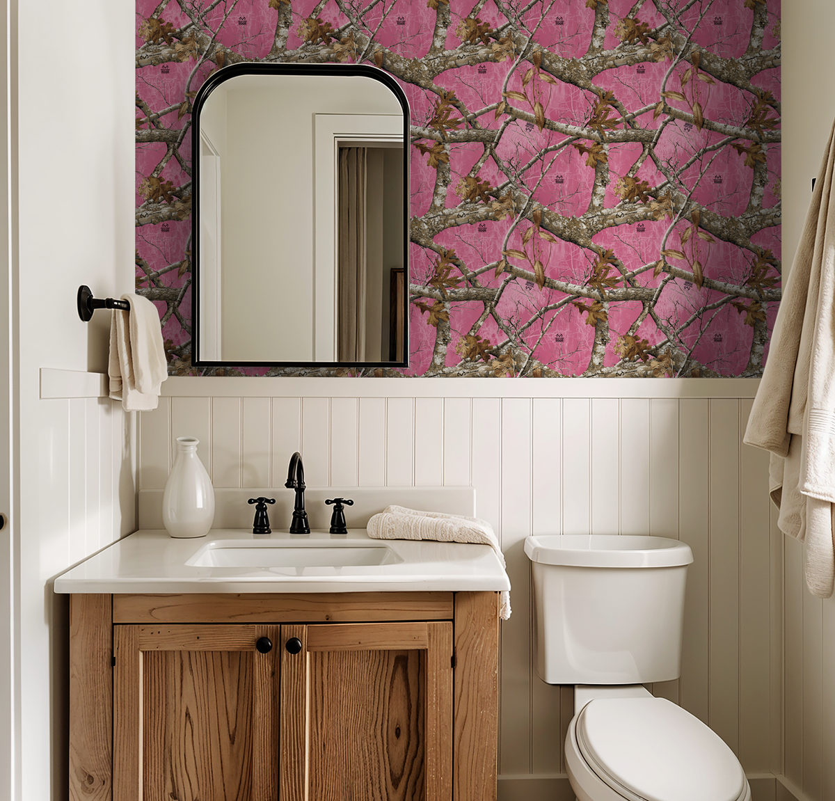 Pink camo wallpaper with branches in rustic bathroom setting.