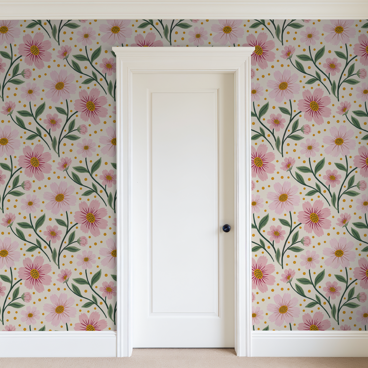 Pink floral wallpaper with green leaves on cream background in a bright room.