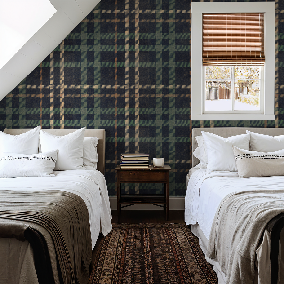 Classic plaid wallpaper in navy, green, and beige in a cozy bedroom with two beds.