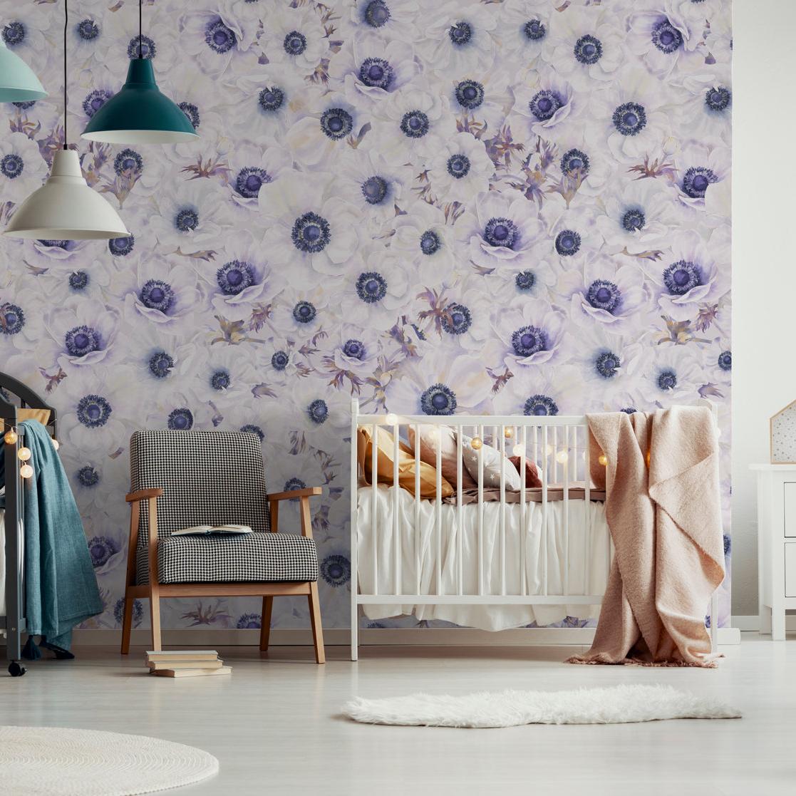 Fleur Blanche Wallpaper by The Nida Jahain Line showcased in a stylish nursery, highlighting its floral elegance.