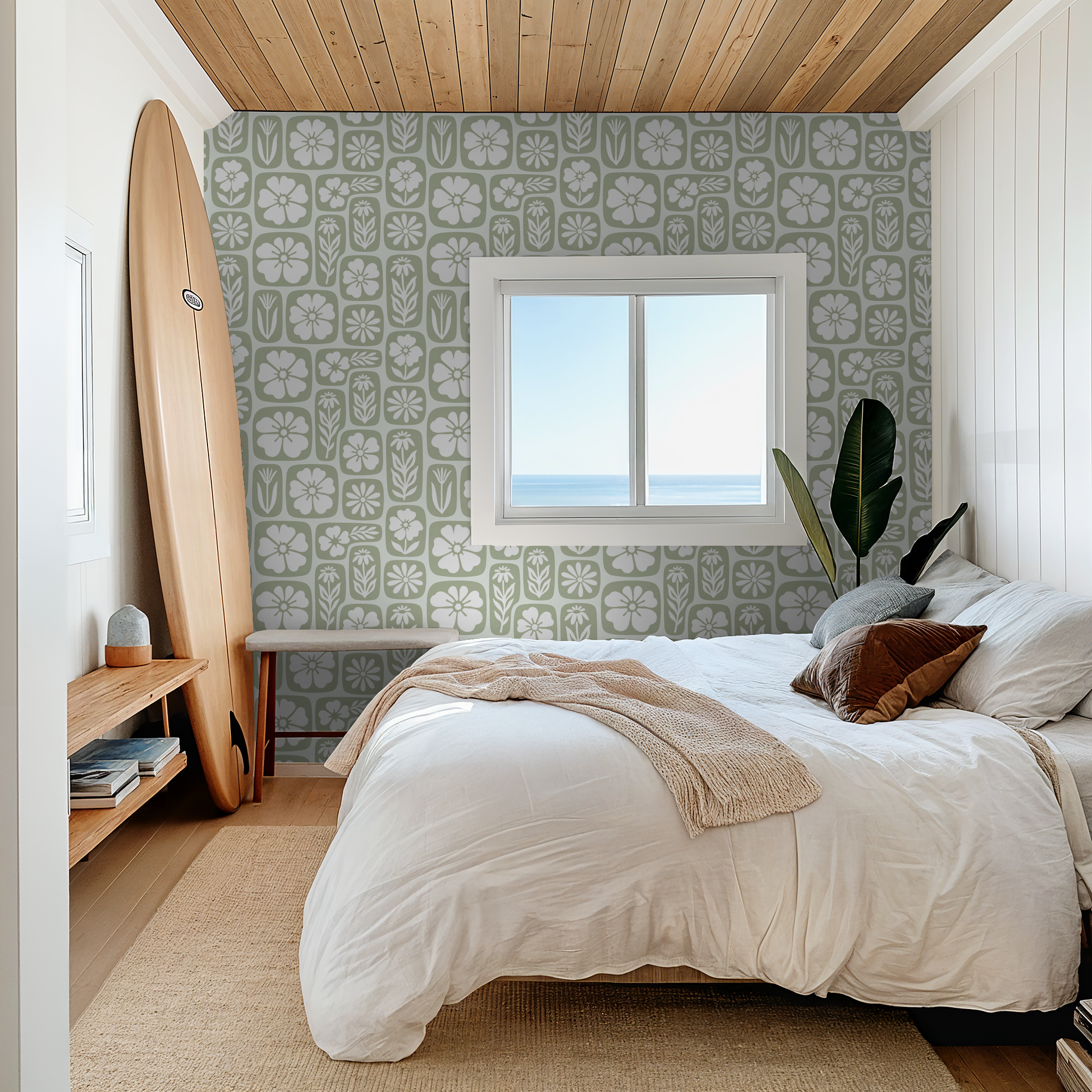 Sage green floral wallpaper in serene bedroom with wooden accents and ocean view.