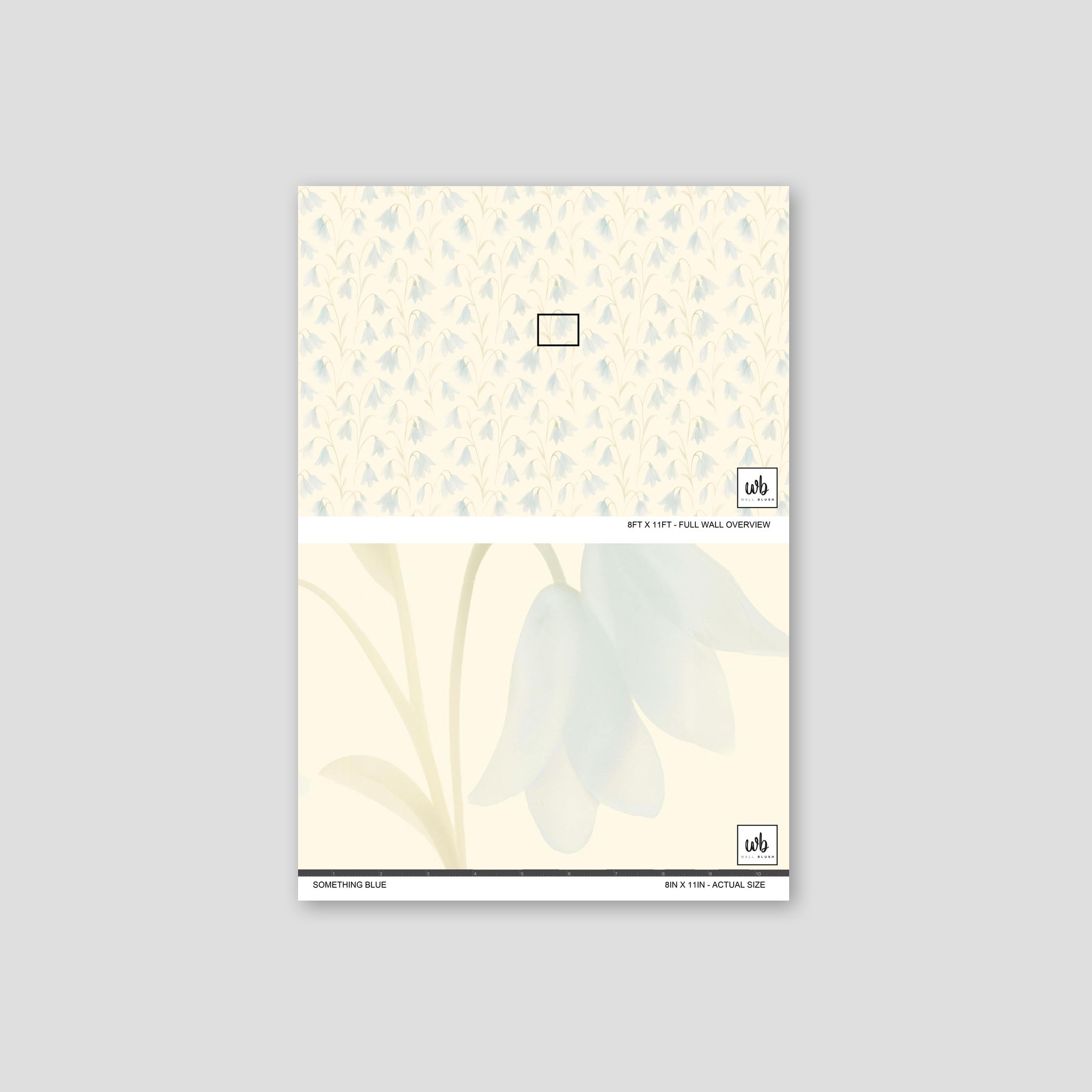 Soft blue floral wallpaper with cream background sample showing delicate botanical pattern.