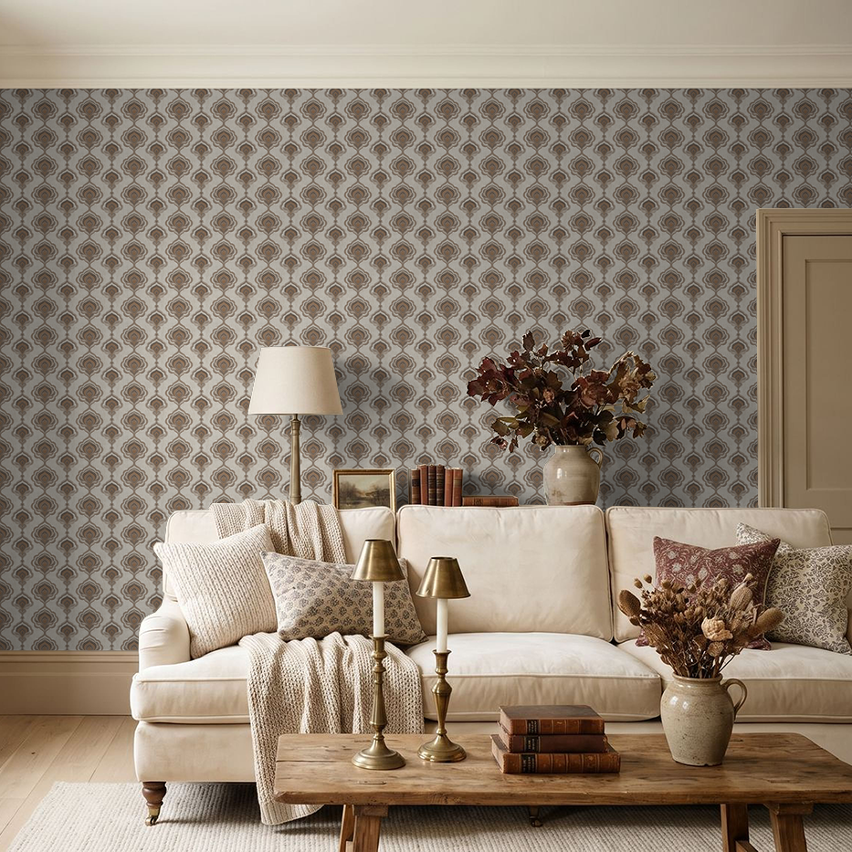 Elegant taupe and charcoal ornate wallpaper in cozy living room with beige sofa.