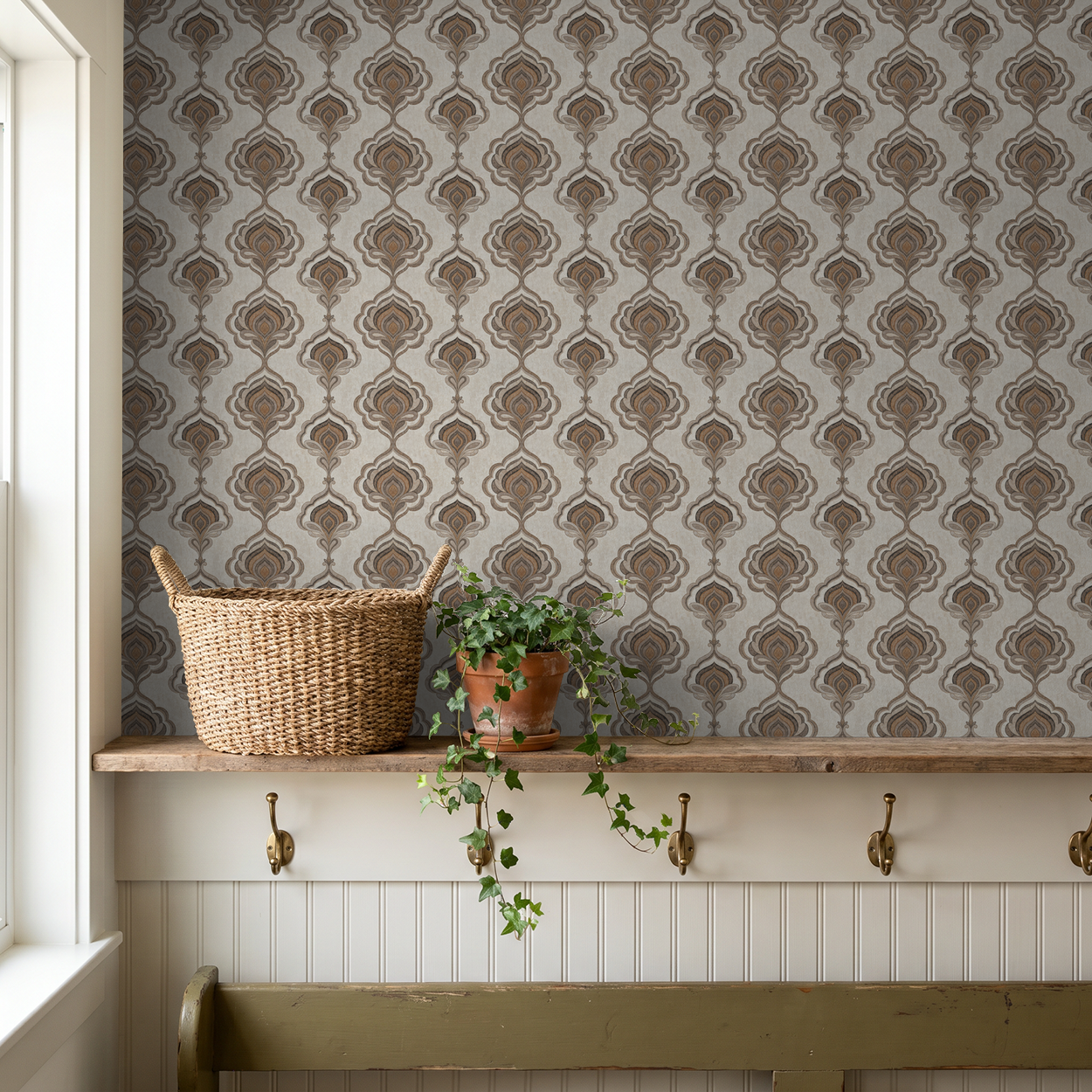 Elegant taupe and charcoal ornate wallpaper in cozy room with plants