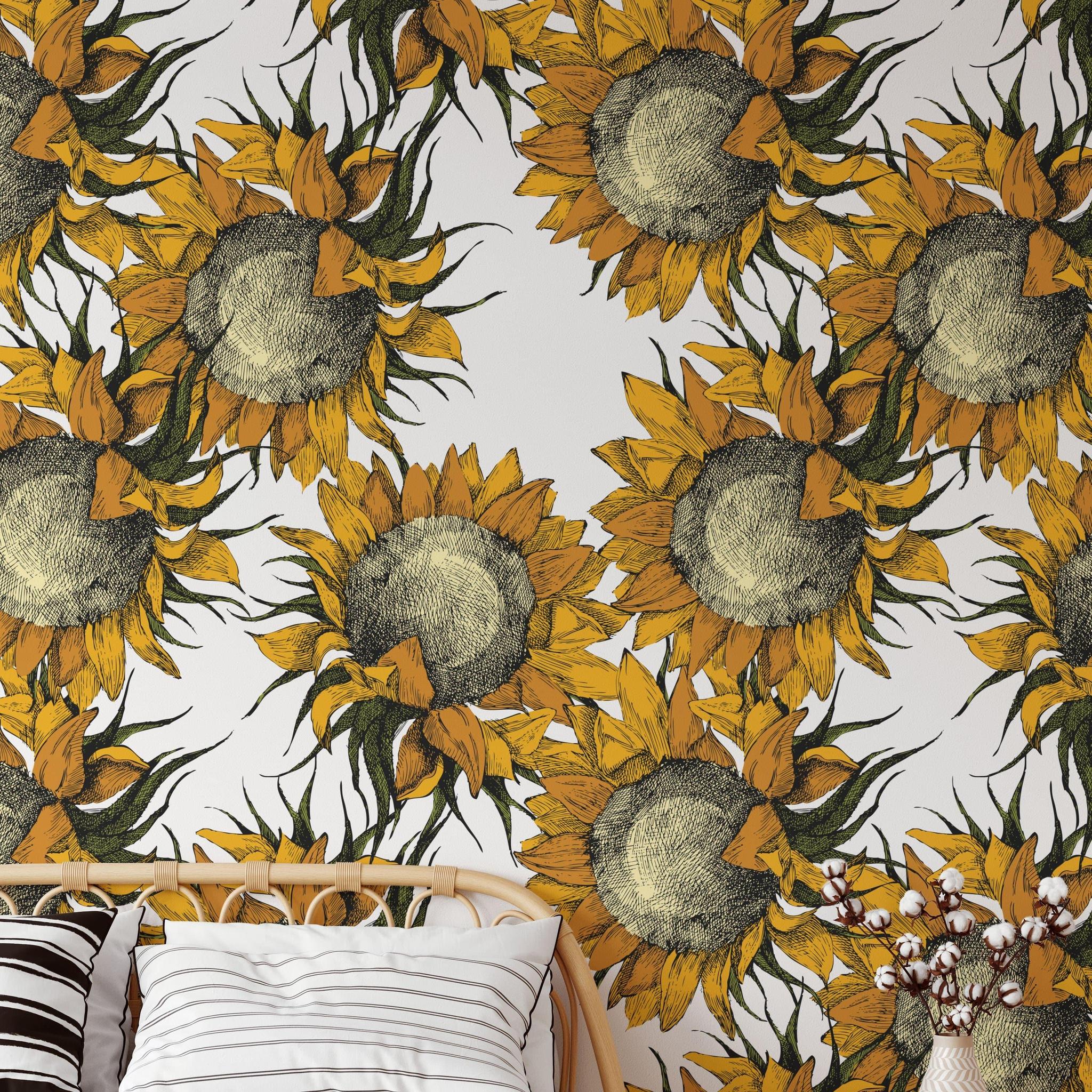 Arie Wallpaper from The Chelsea DeBoer Line in a cozy bedroom, highlighting vibrant sunflower pattern.