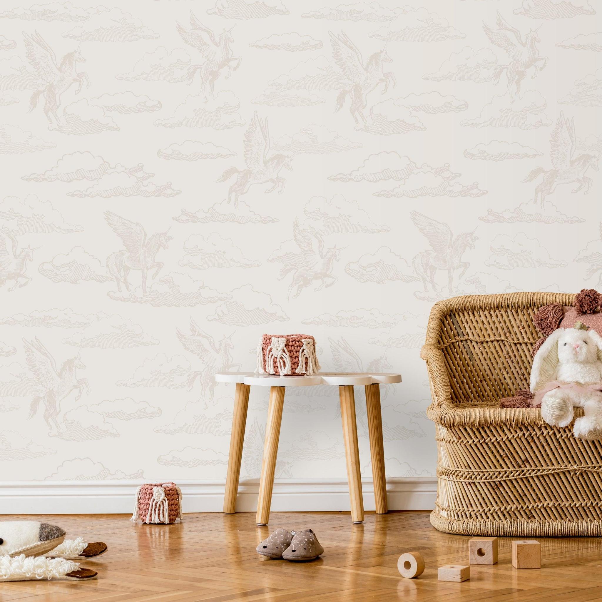 Enchanted (Off White) Wallpaper by Wall Blush SG02 in a cozy nursery room, featuring whimsical unicorn patterns.